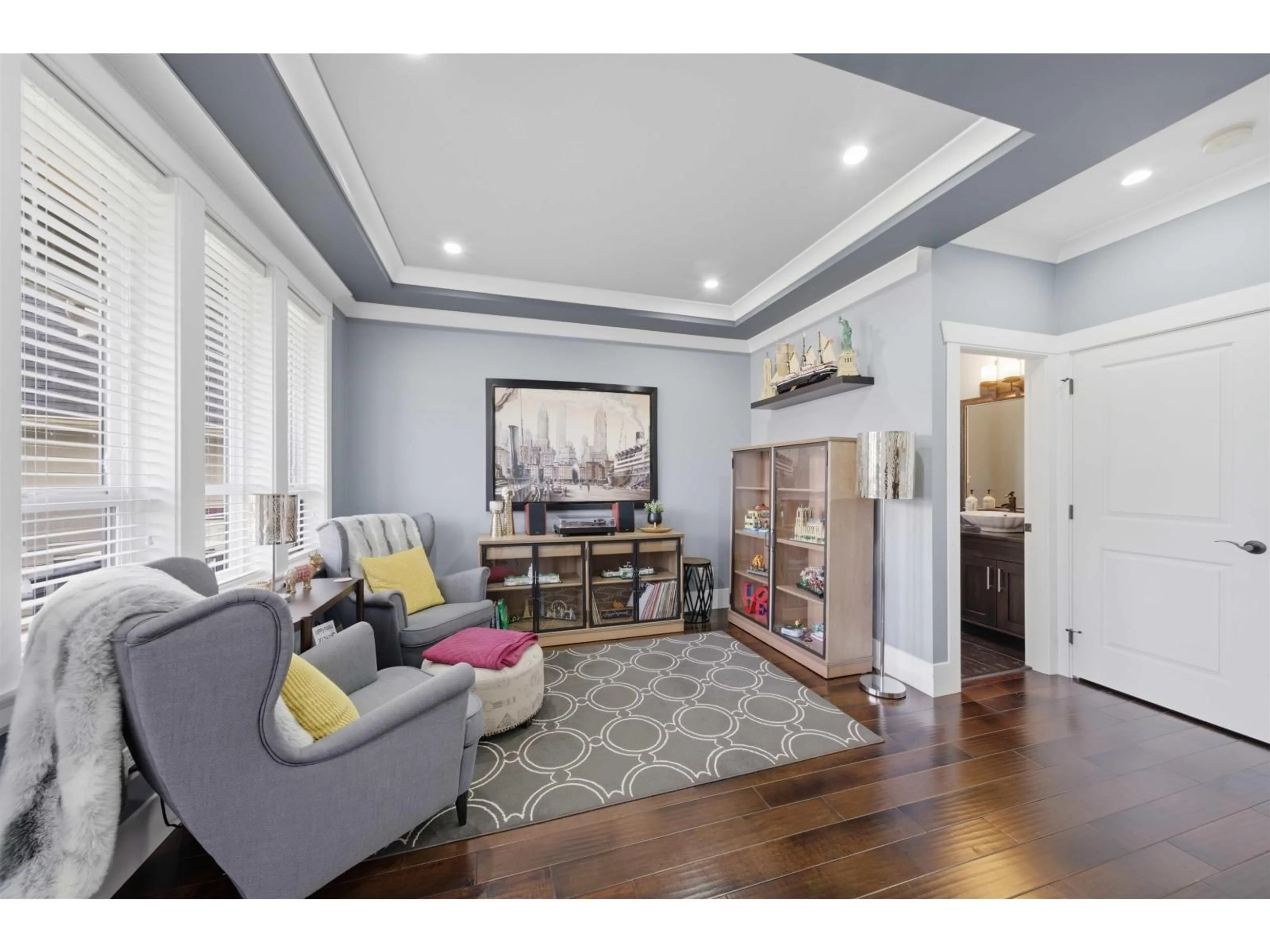 Living room with furniture, wood/laminate floor for 1925 MERLOT BOULEVARD, Abbotsford British Columbia V4X0A6