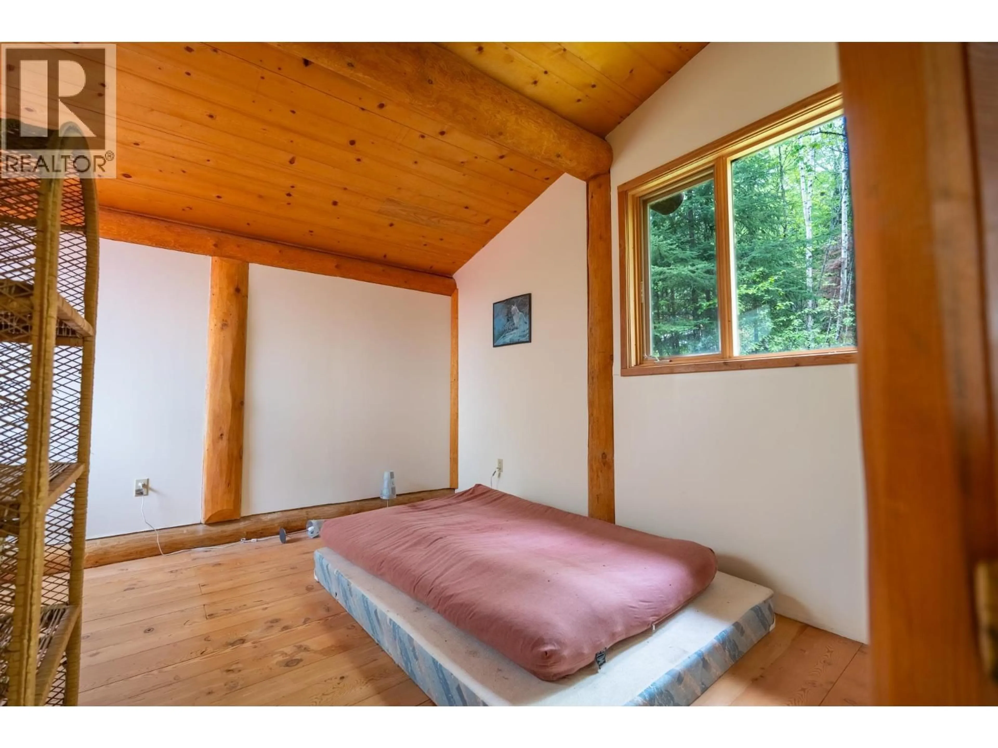 Bedroom with bed, wood/laminate floor for 34286 16 HIGHWAY, Prince George British Columbia V2N6X2