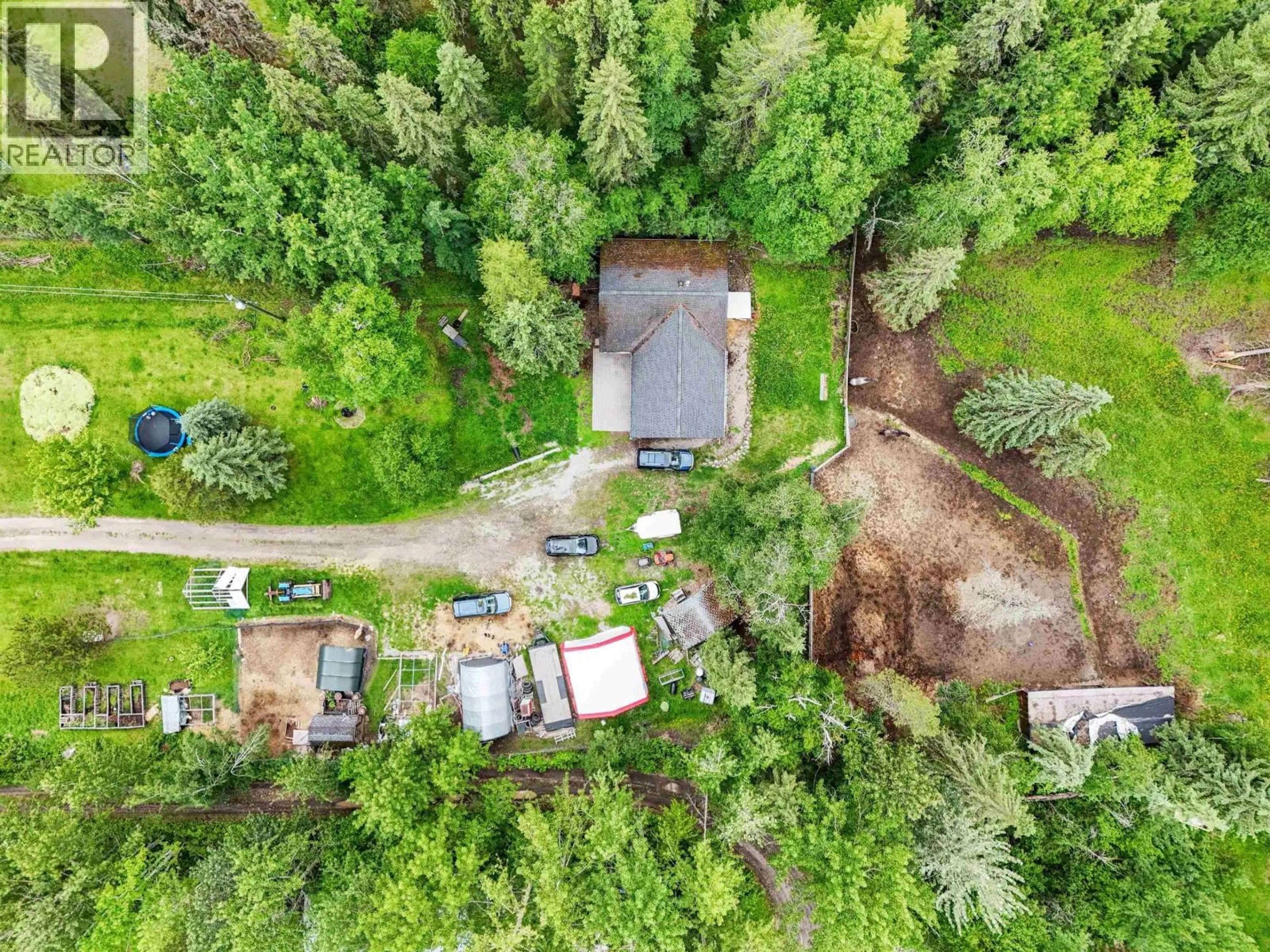 A pic from outside/outdoor area/front of a property/back of a property/a pic from drone, forest/trees view for 3222 HAYMAN CRESCENT, Quesnel British Columbia V2J6K7