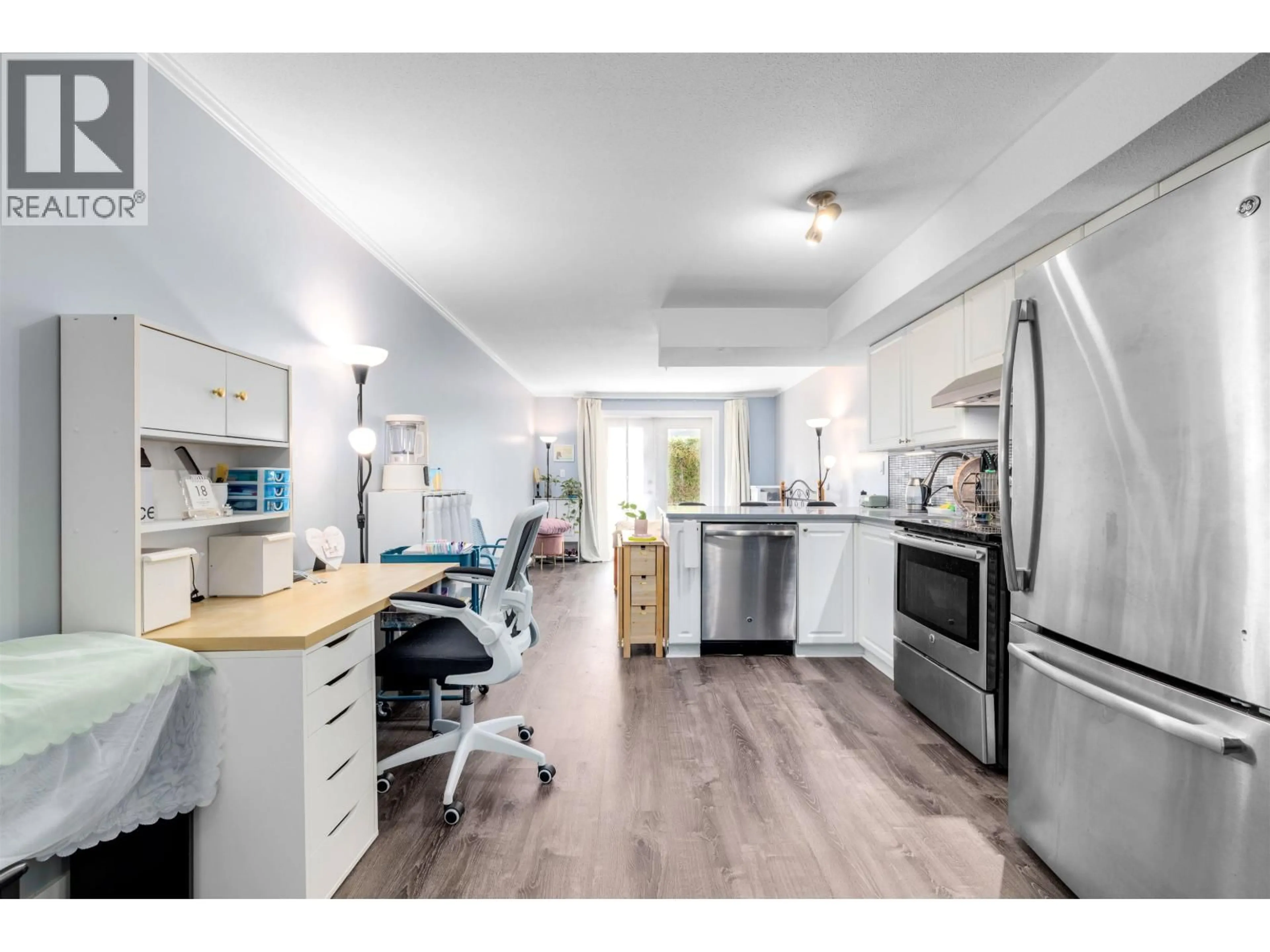 Open concept kitchen, wood/laminate floor for 145 - 5880 DOVER CRESCENT, Richmond British Columbia V7C5P5