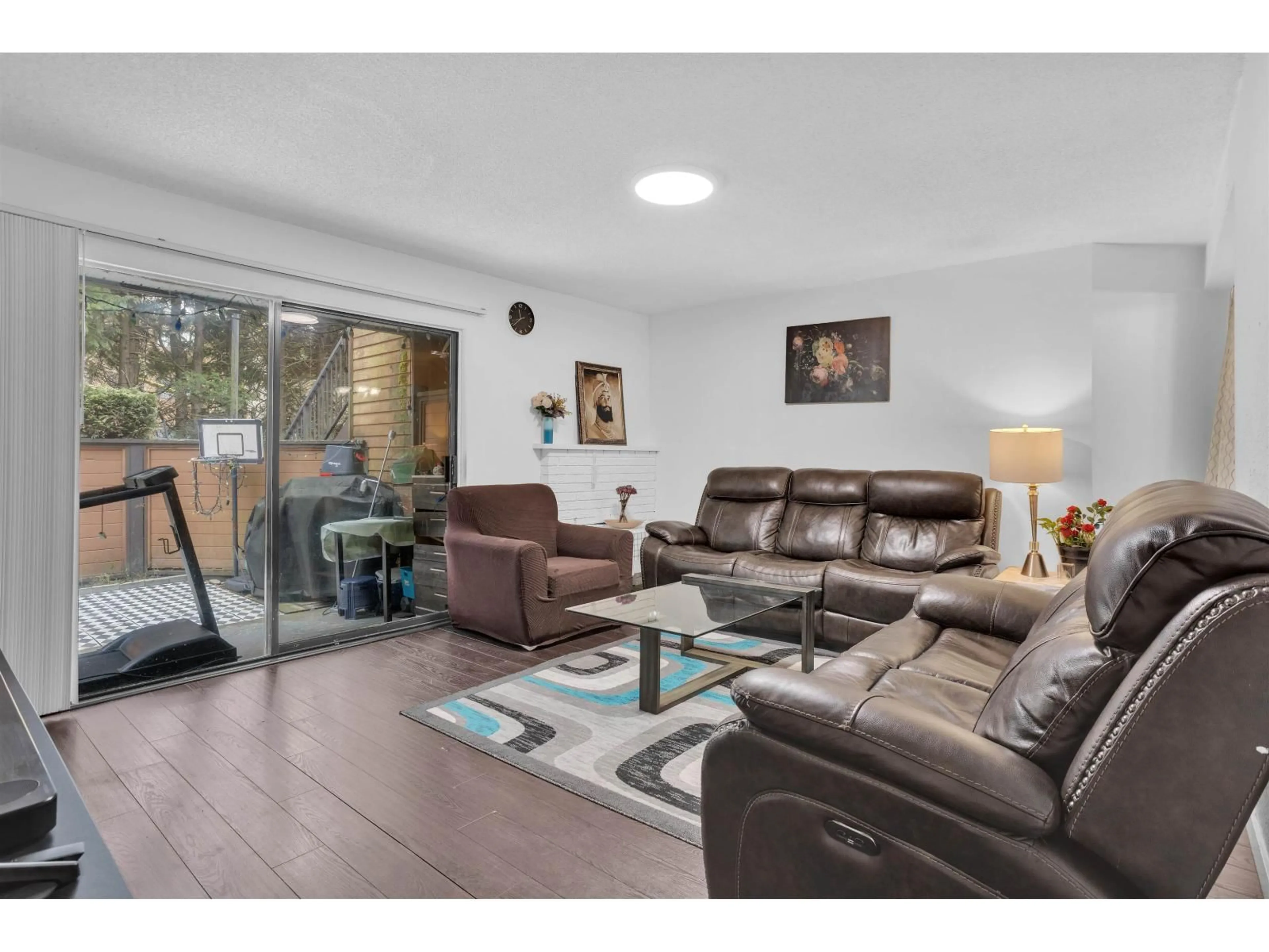Living room with furniture, wood/laminate floor for 1204 - 10620 150 STREET, Surrey British Columbia V3R7S1