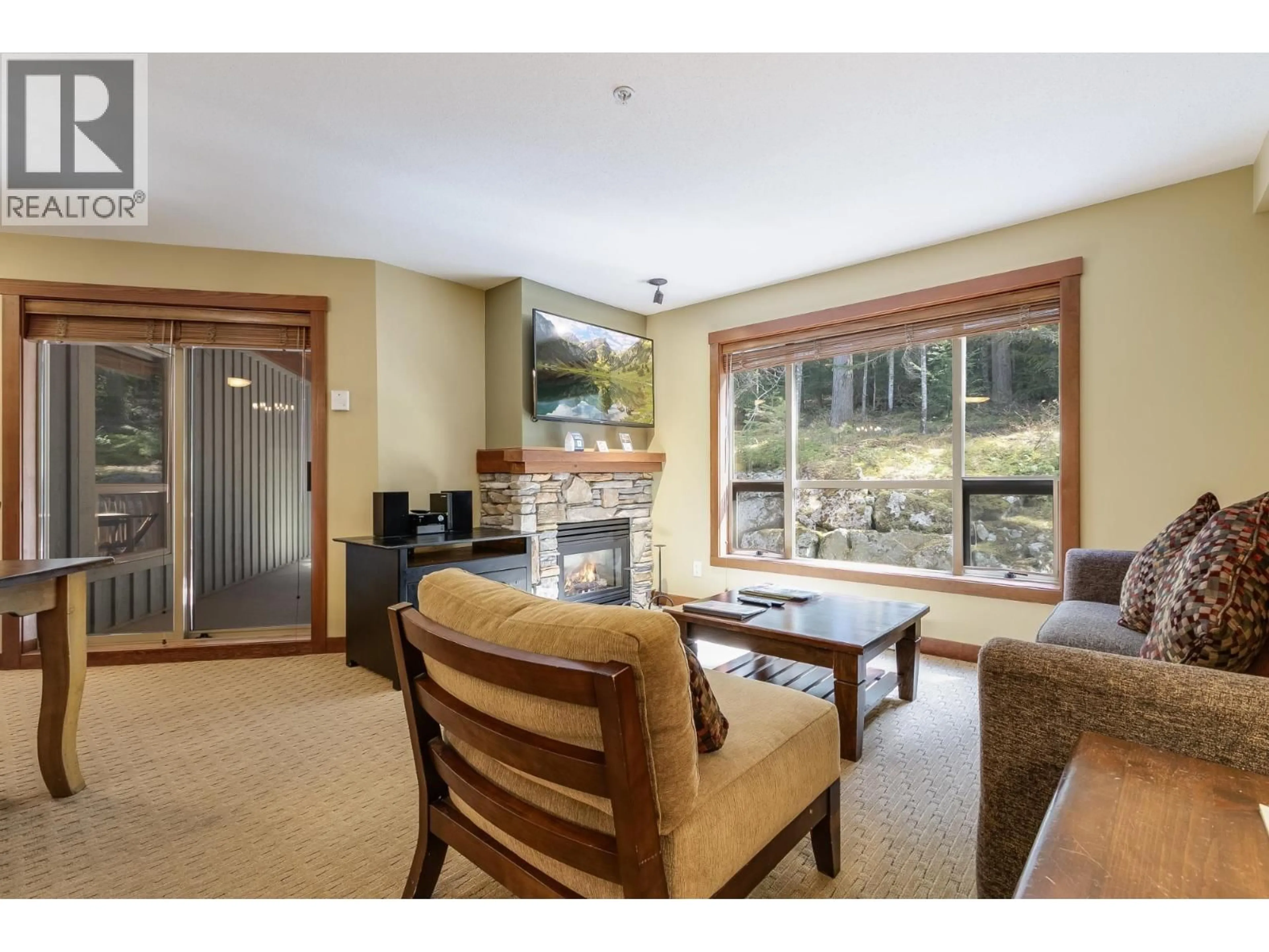 Living room with furniture, unknown for 214G1 - 4653 BLACKCOMB WAY, Whistler British Columbia V8E0Y9