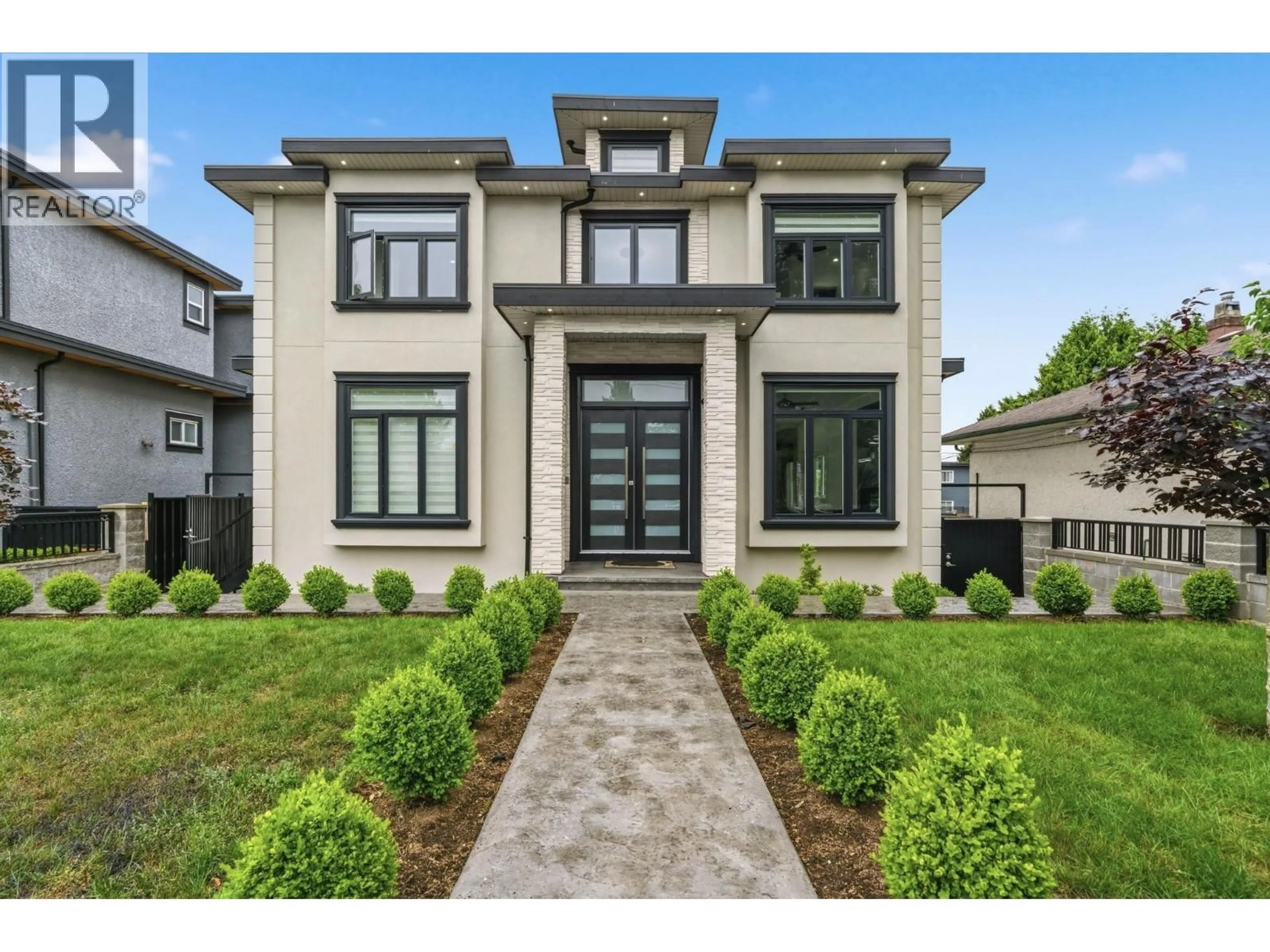 Home with brick exterior material, street for 8348 12TH AVENUE, Burnaby British Columbia V3N2L6