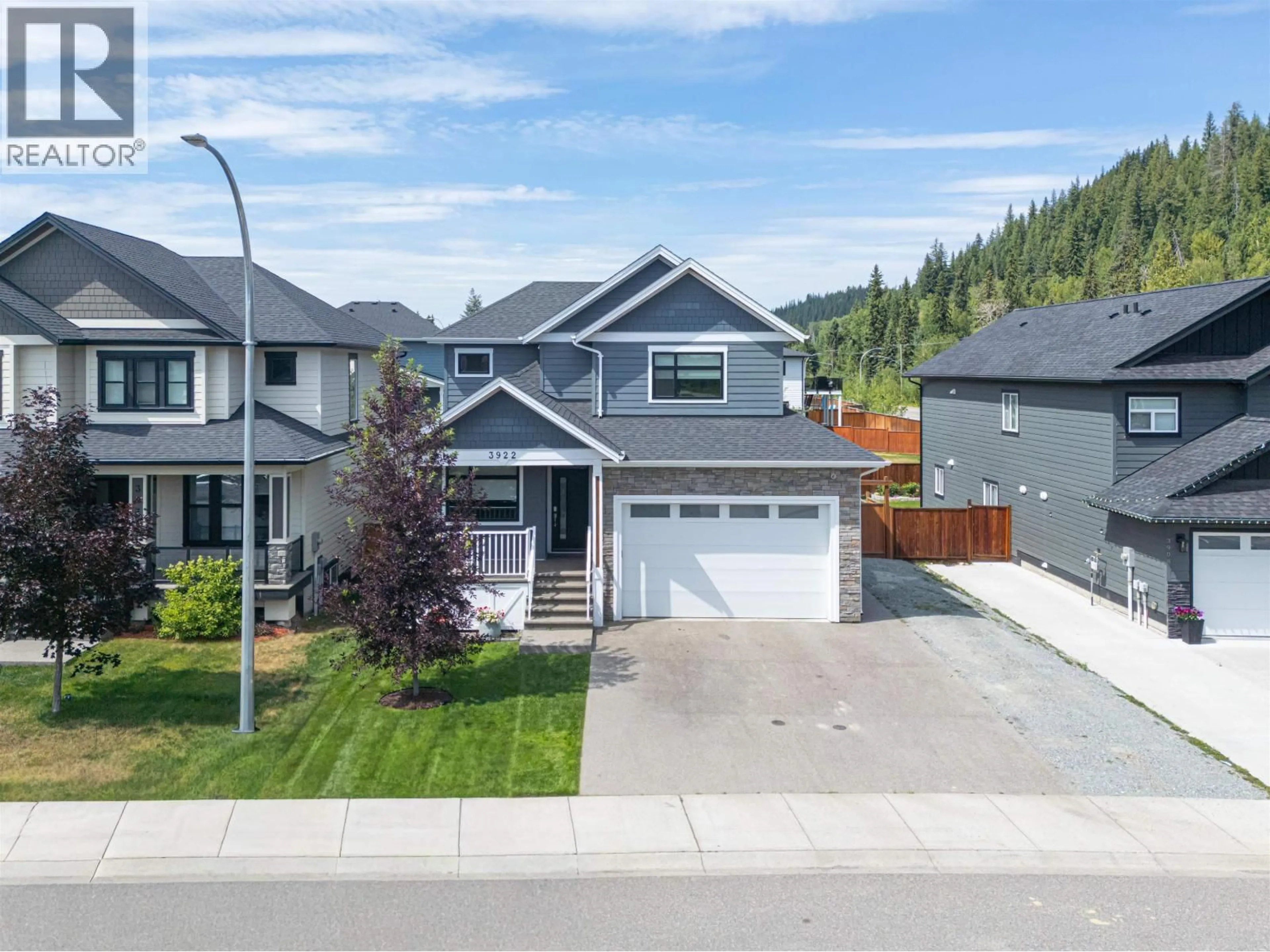 A pic from outside/outdoor area/front of a property/back of a property/a pic from drone, street for 3922 AREND DRIVE, Prince George British Columbia V2K0B1