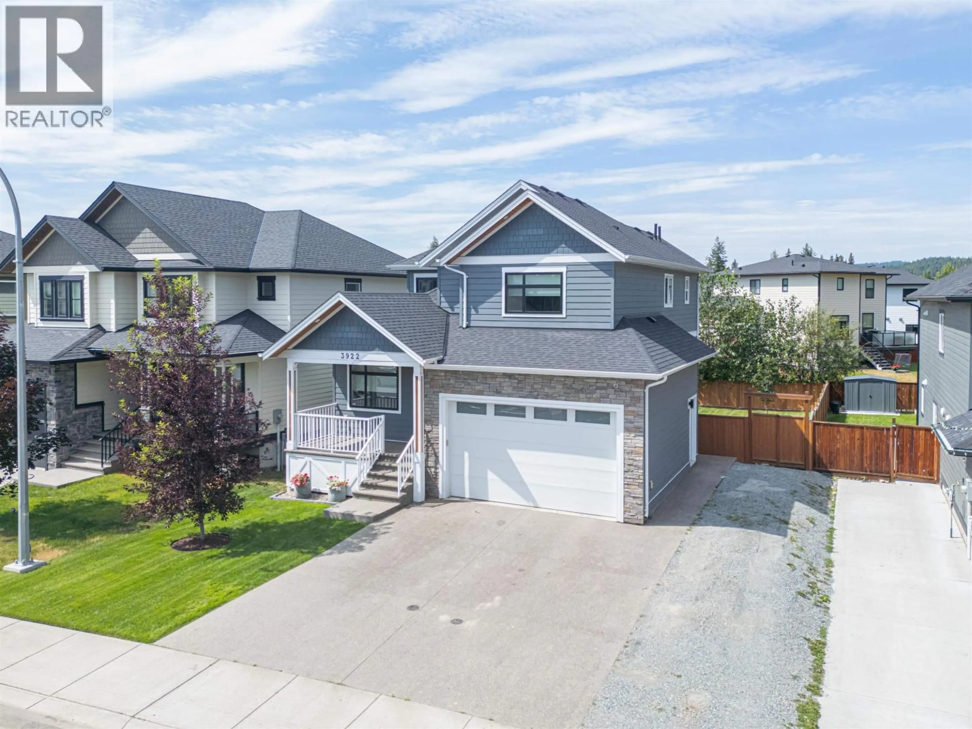 A pic from outside/outdoor area/front of a property/back of a property/a pic from drone, street for 3922 AREND DRIVE, Prince George British Columbia V2K0B1