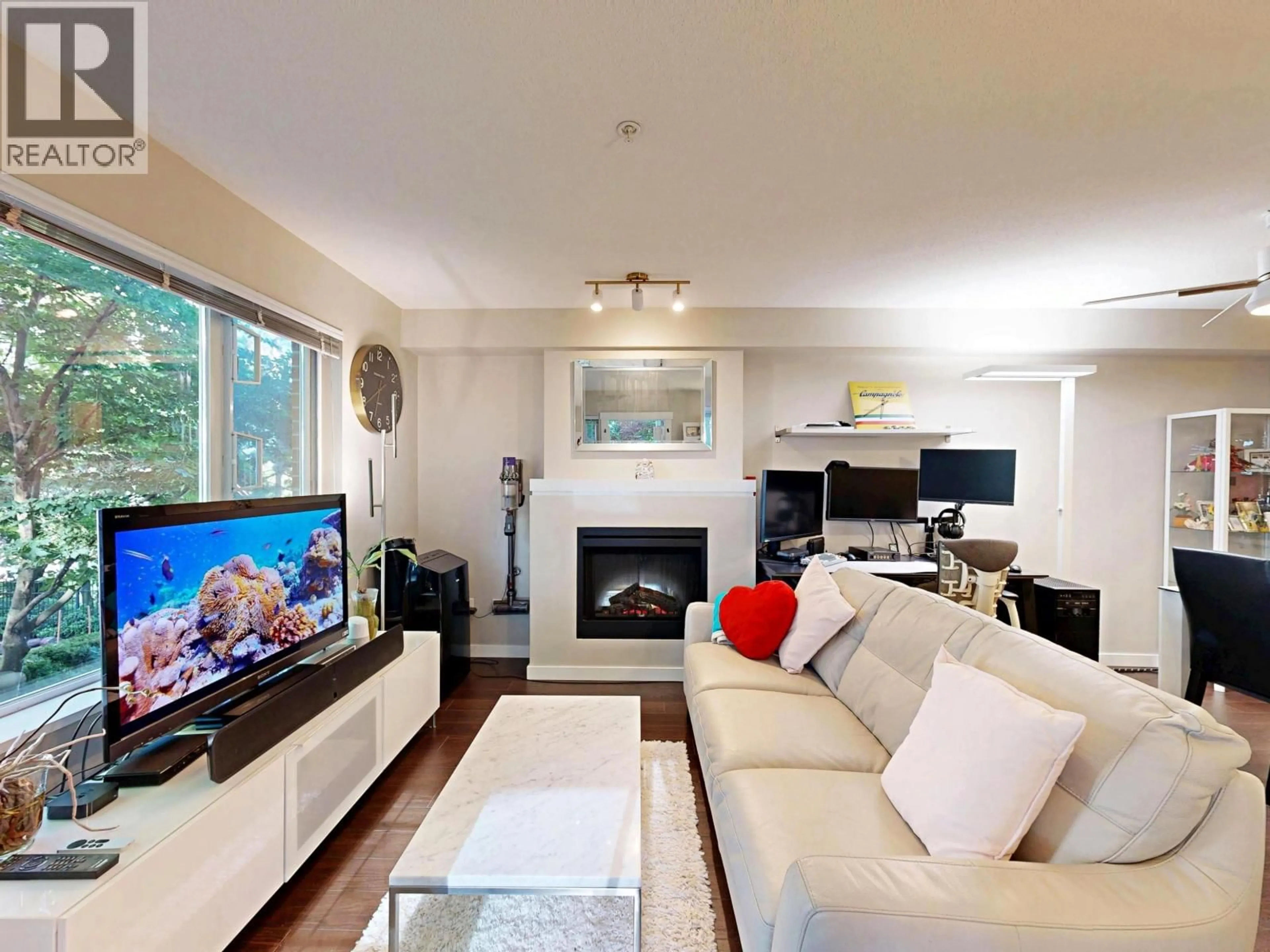 Living room with furniture, wood/laminate floor for 207 - 4783 DAWSON STREET, Burnaby British Columbia V5C0A8