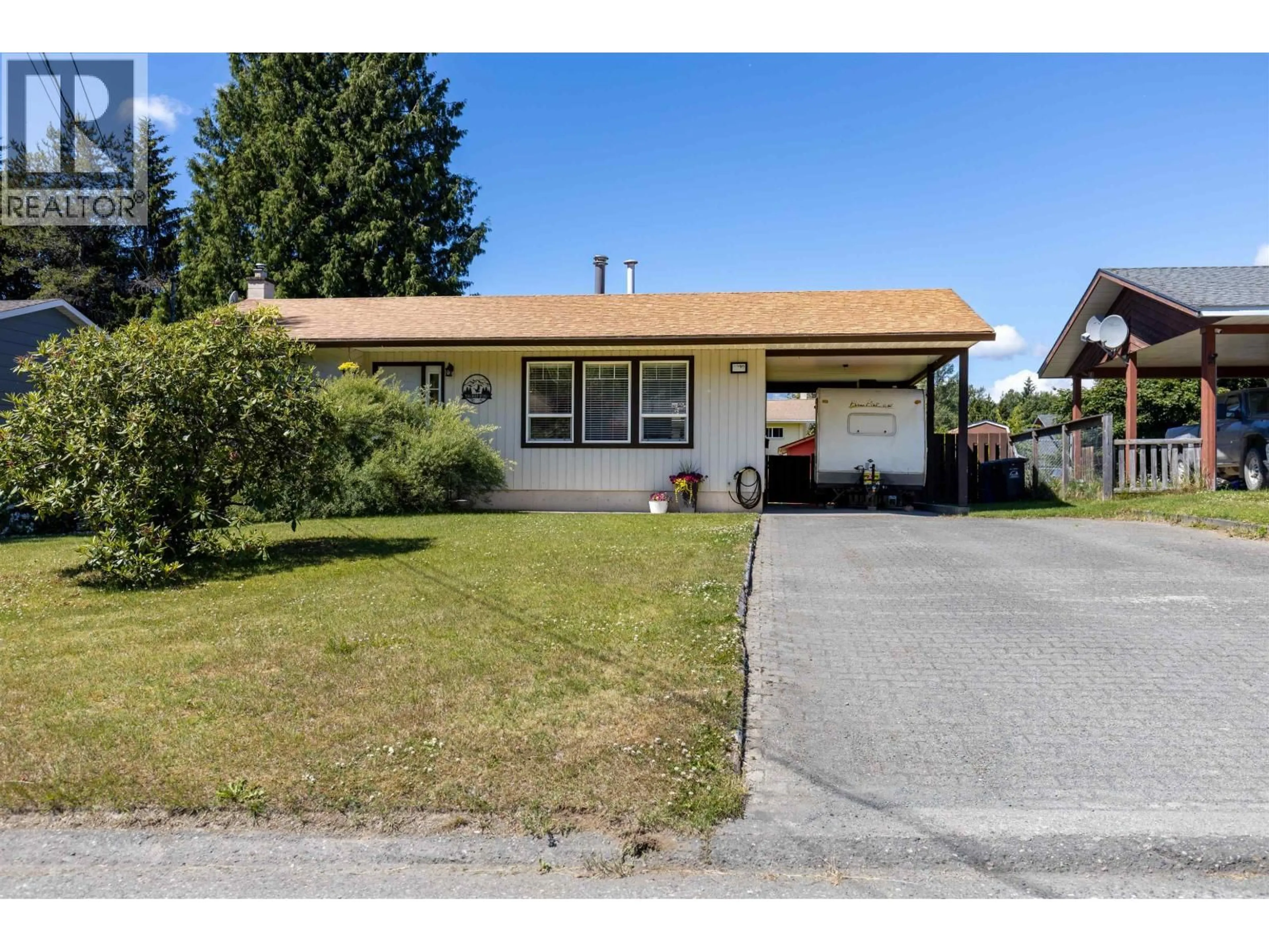 Home with vinyl exterior material, street for 2219 EVERGREEN STREET, Terrace British Columbia V8G4S6