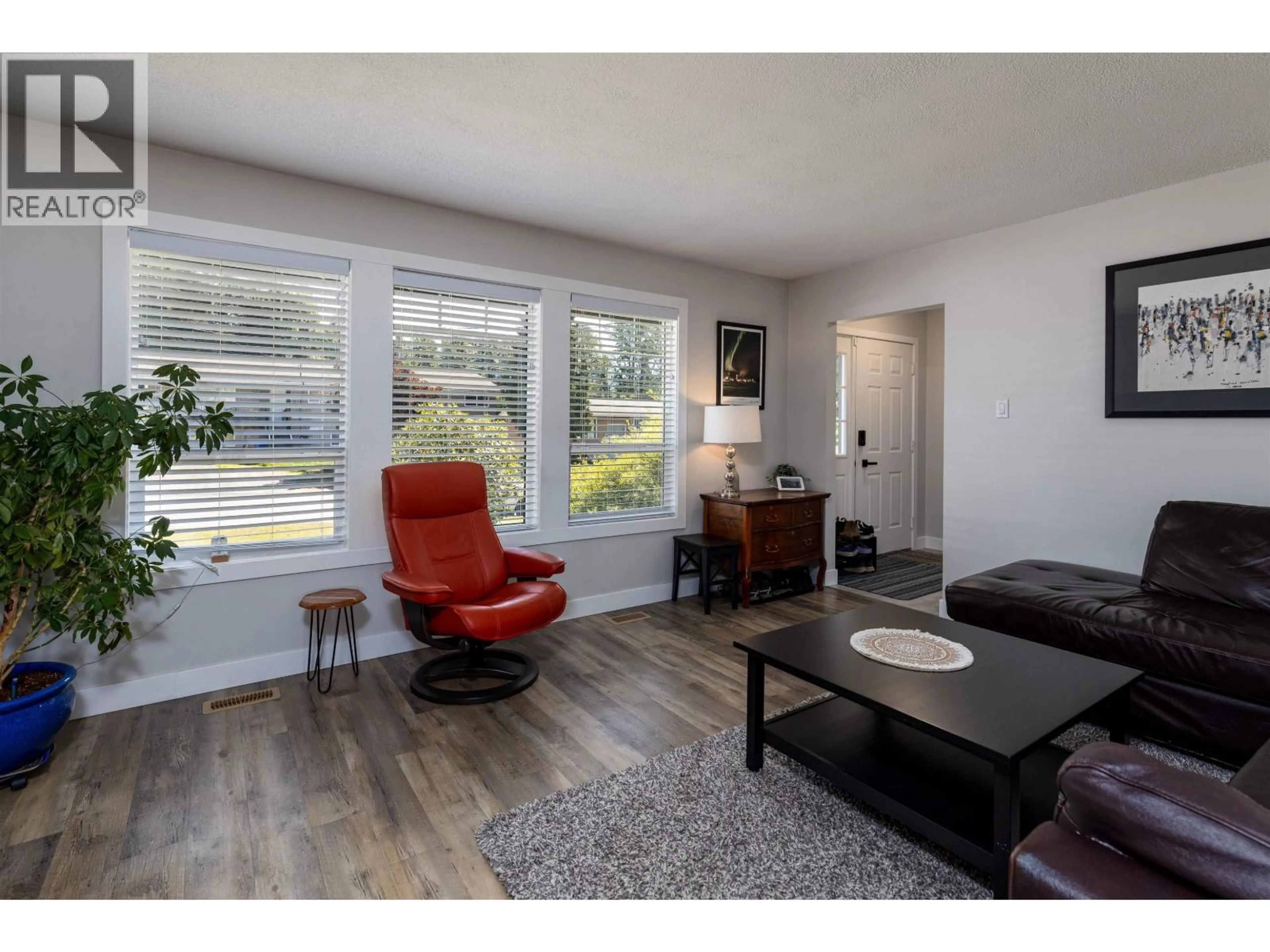 Living room with furniture, wood/laminate floor for 2219 EVERGREEN STREET, Terrace British Columbia V8G4S6
