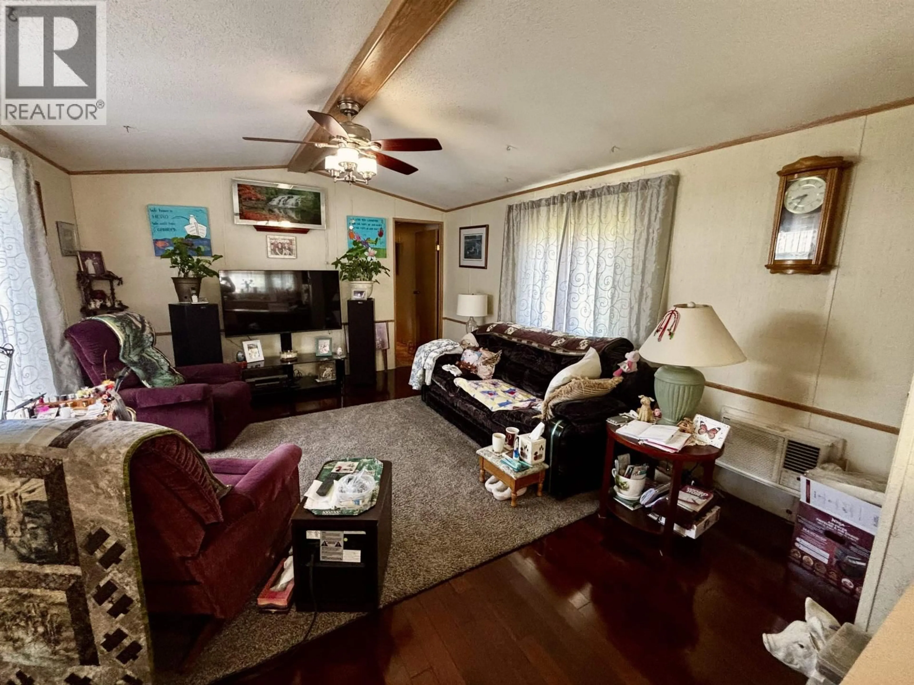 Living room with furniture, wood/laminate floor for 125 - 1000 INVERNESS ROAD, Prince George British Columbia V2N4V1