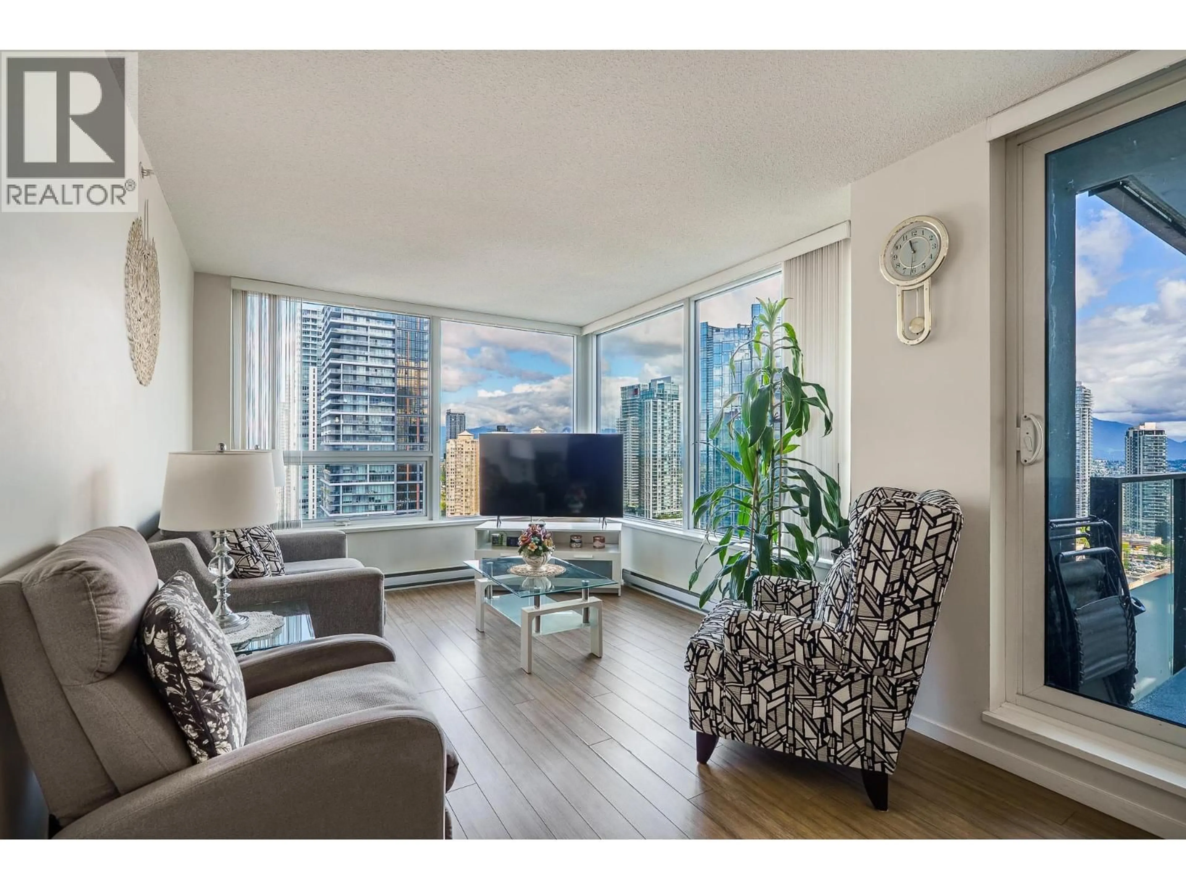 Living room with furniture, wood/laminate floor for 3007 - 6658 DOW AVENUE, Burnaby British Columbia V5H0C7