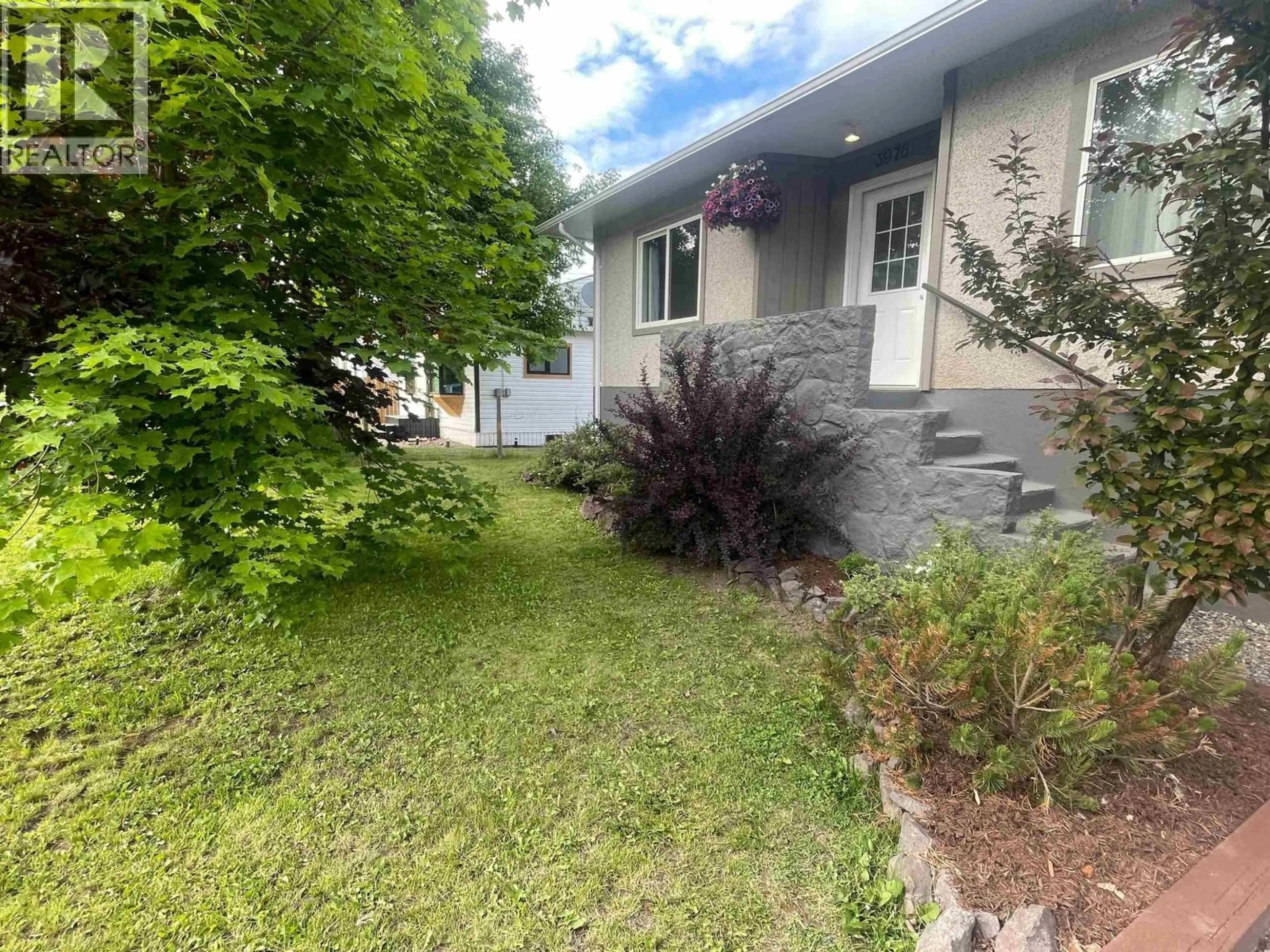 A pic from outside/outdoor area/front of a property/back of a property/a pic from drone, street for 3976 ALFRED AVENUE, Smithers British Columbia V0J2N0