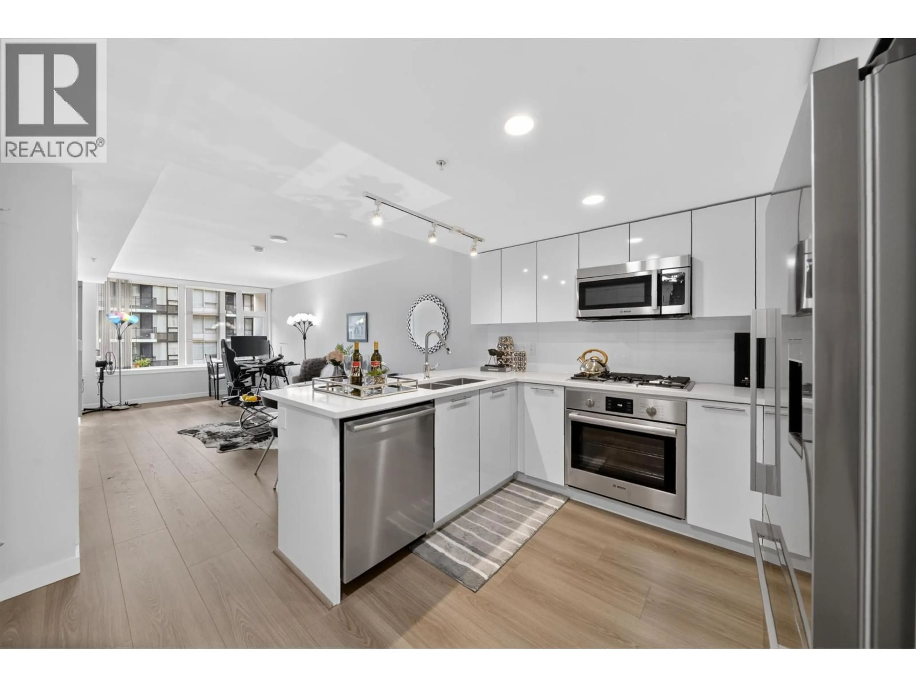 Open concept kitchen, unknown for 507 - 8699 HAZELBRIDGE WAY, Richmond British Columbia V6X0T4
