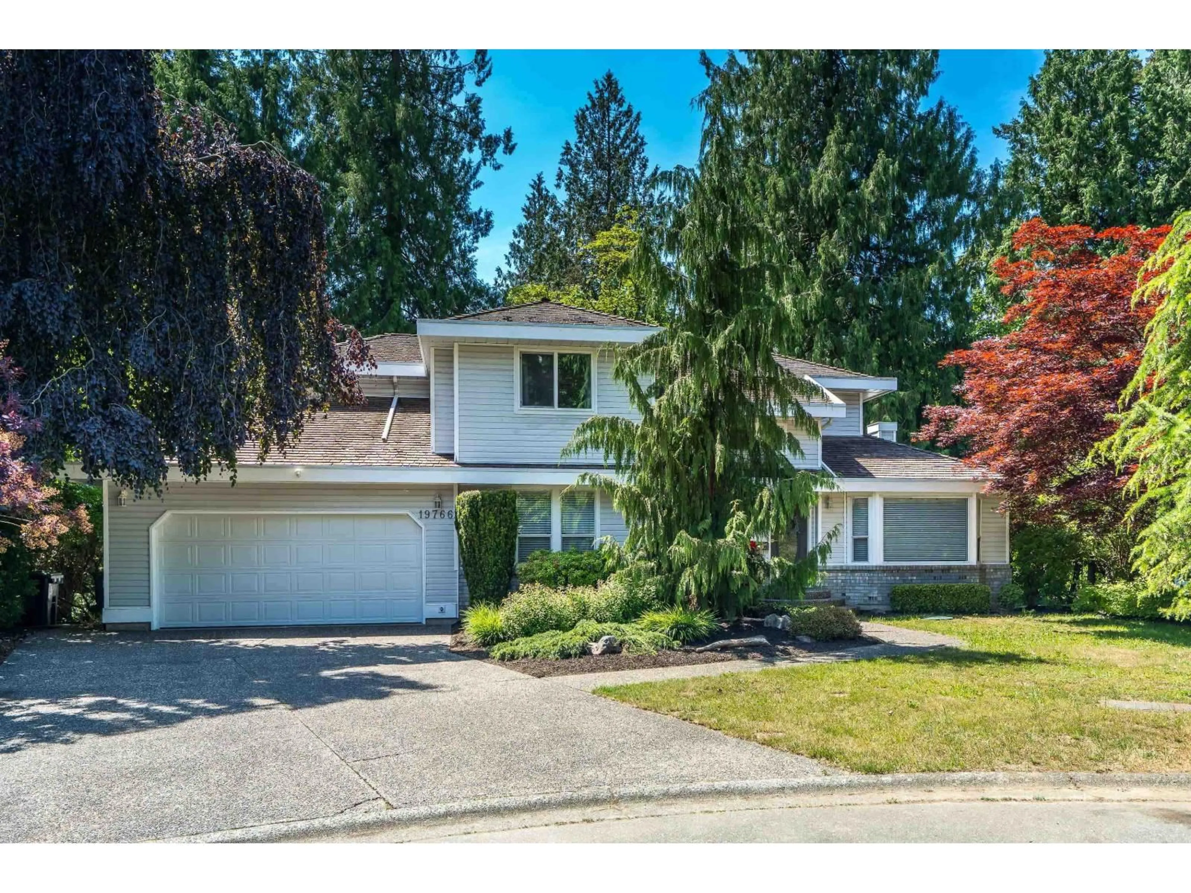 Home with vinyl exterior material, street for 19766 43 AVENUE, Langley British Columbia V3A8G1