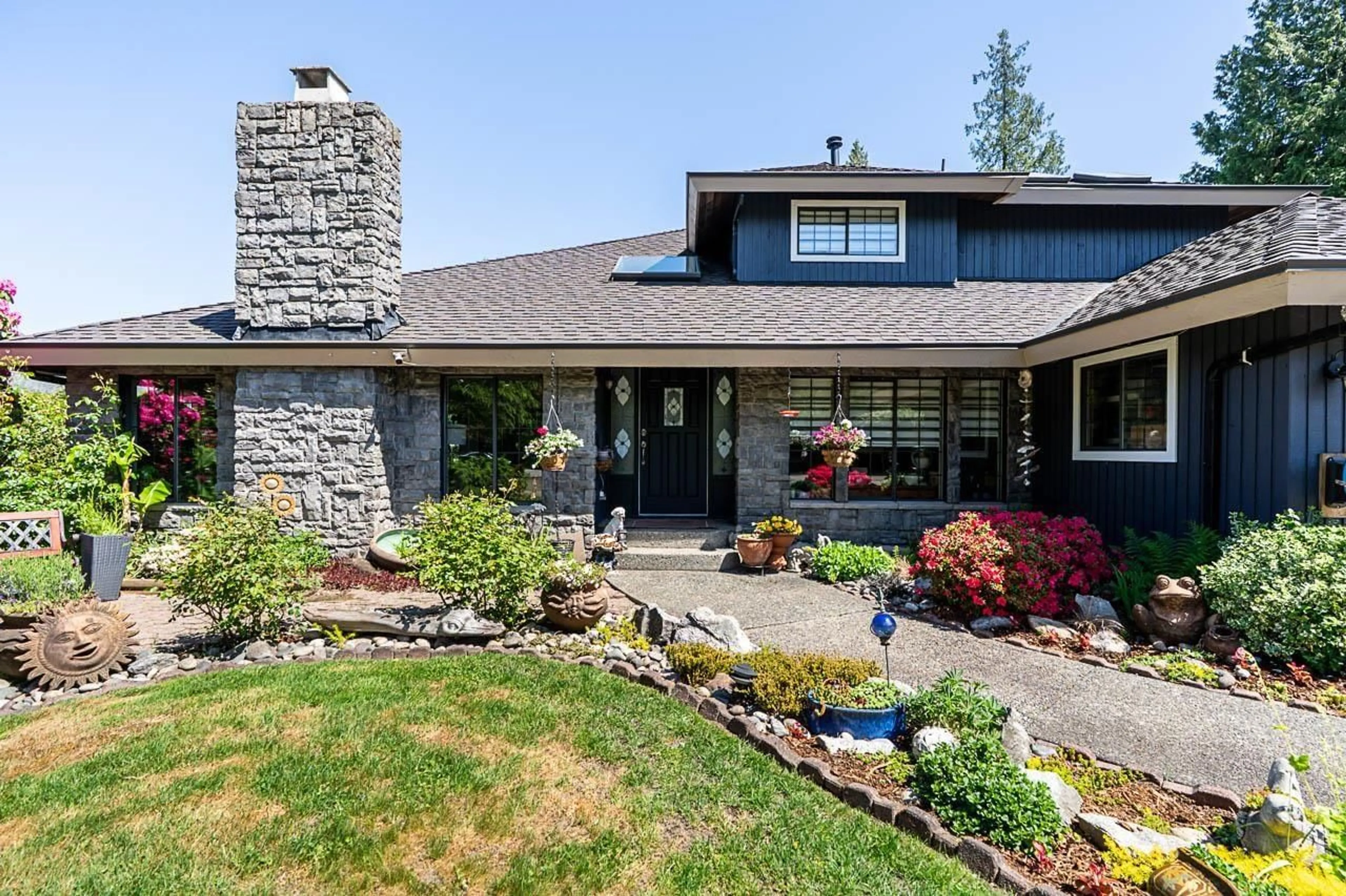 Home with brick exterior material, mountain view for 3892 155 STREET, Surrey British Columbia V3Z0G7