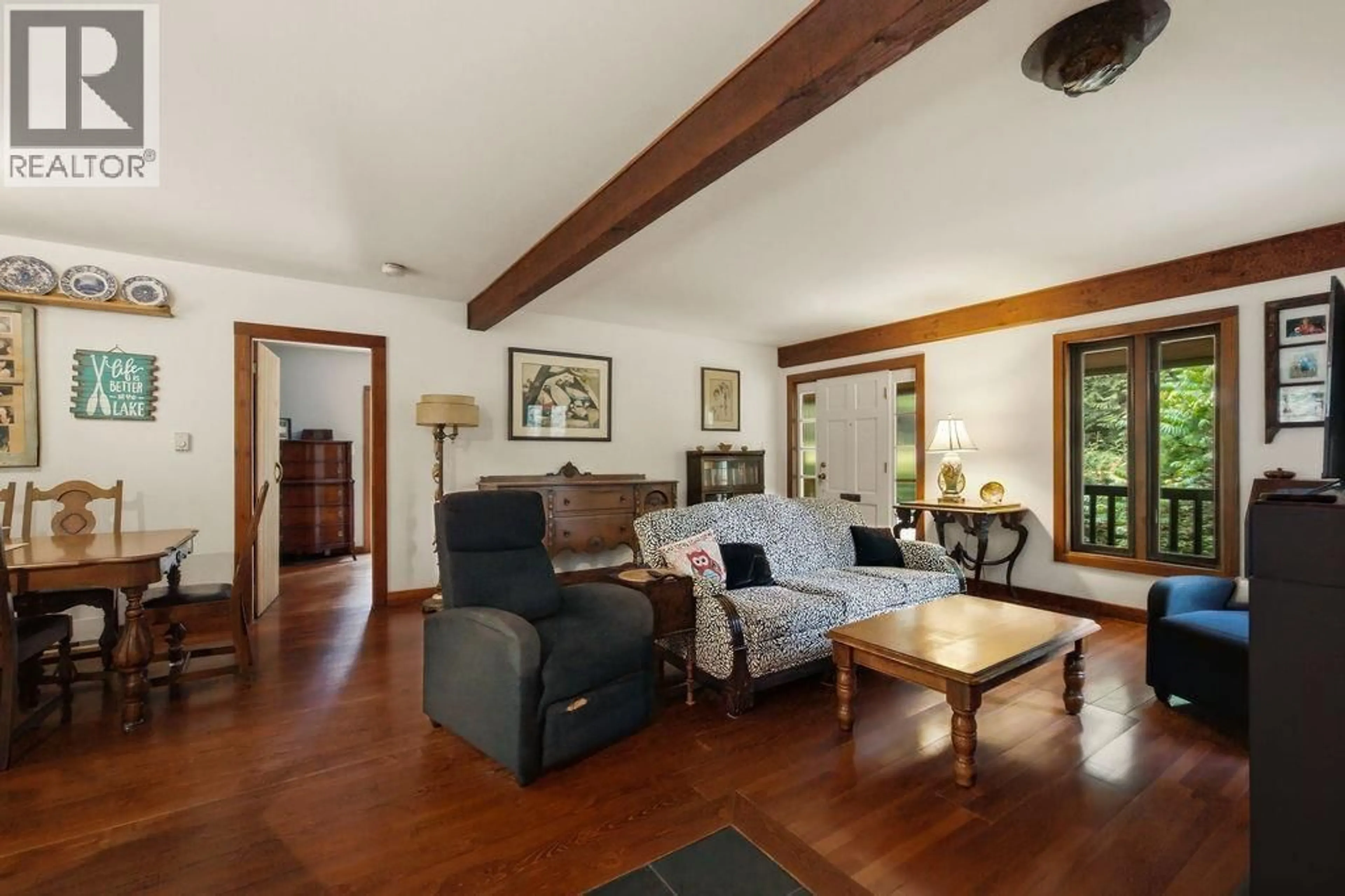 Living room with furniture, wood/laminate floor for 6084 NORTH LAKE ROAD, Egmont British Columbia V0N1N0