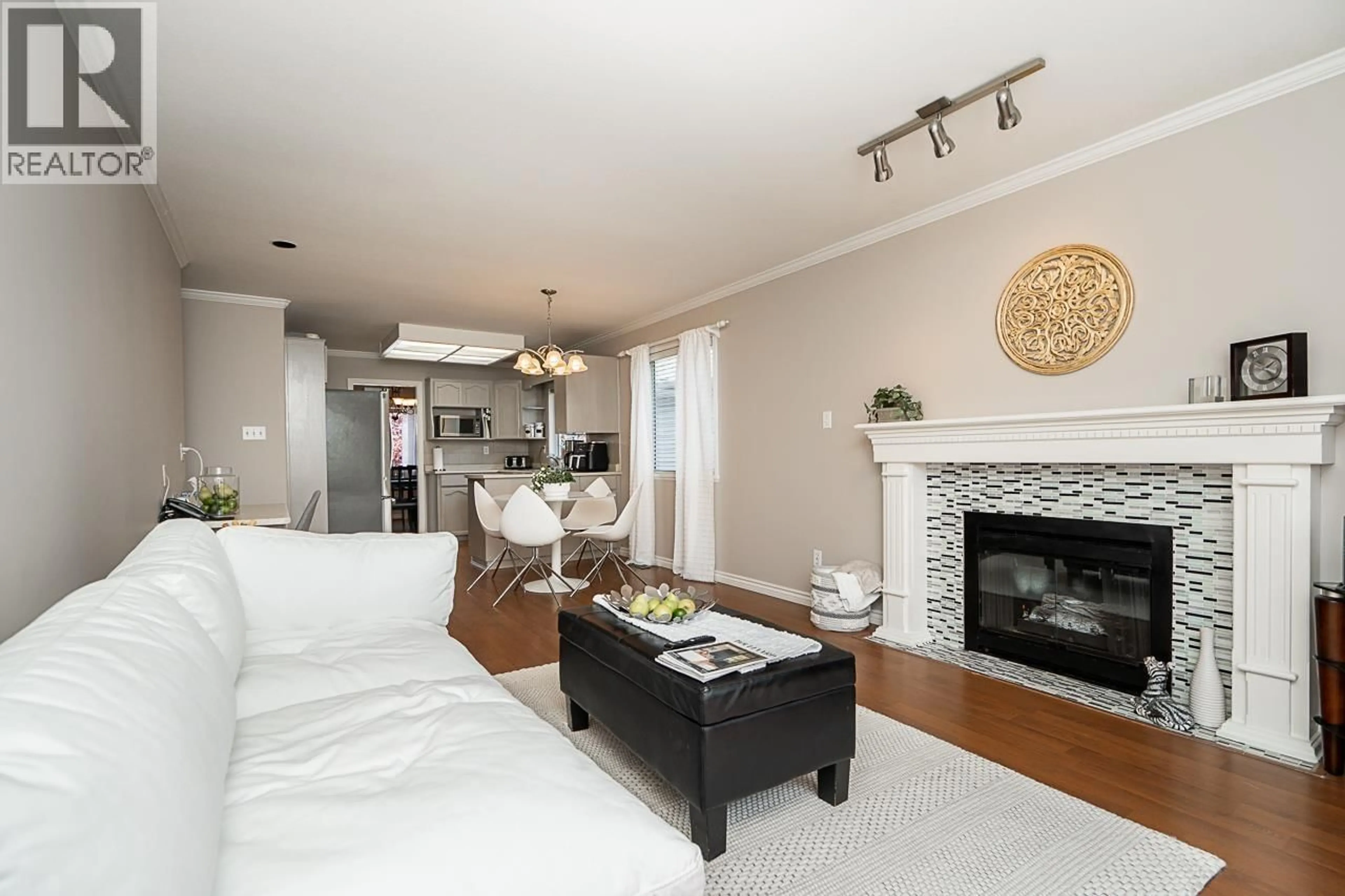 Living room with furniture, ceramic/tile floor for 1932 JACANA AVENUE, Port Coquitlam British Columbia V3C5Y4