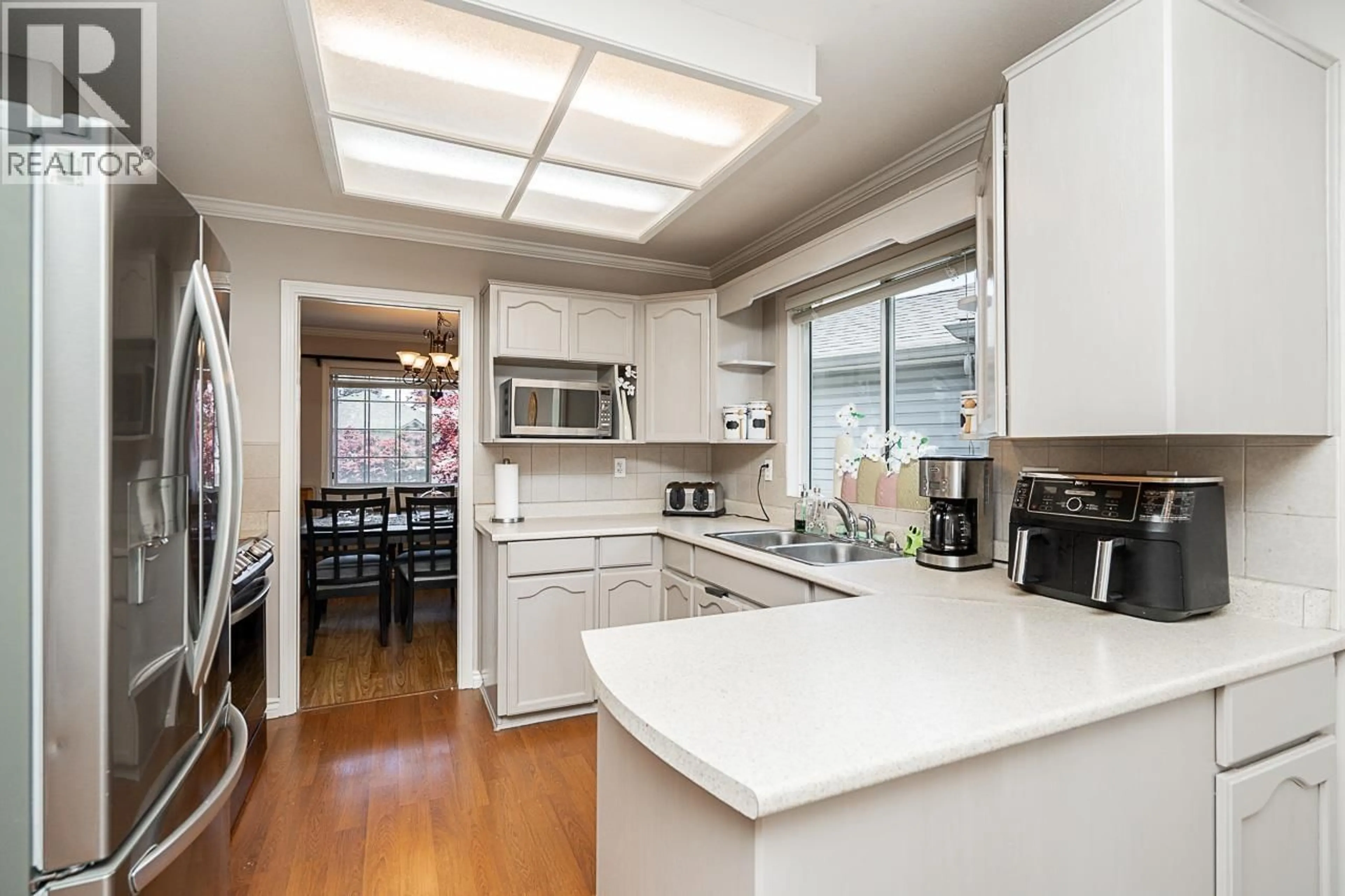 Open concept kitchen, unknown for 1932 JACANA AVENUE, Port Coquitlam British Columbia V3C5Y4