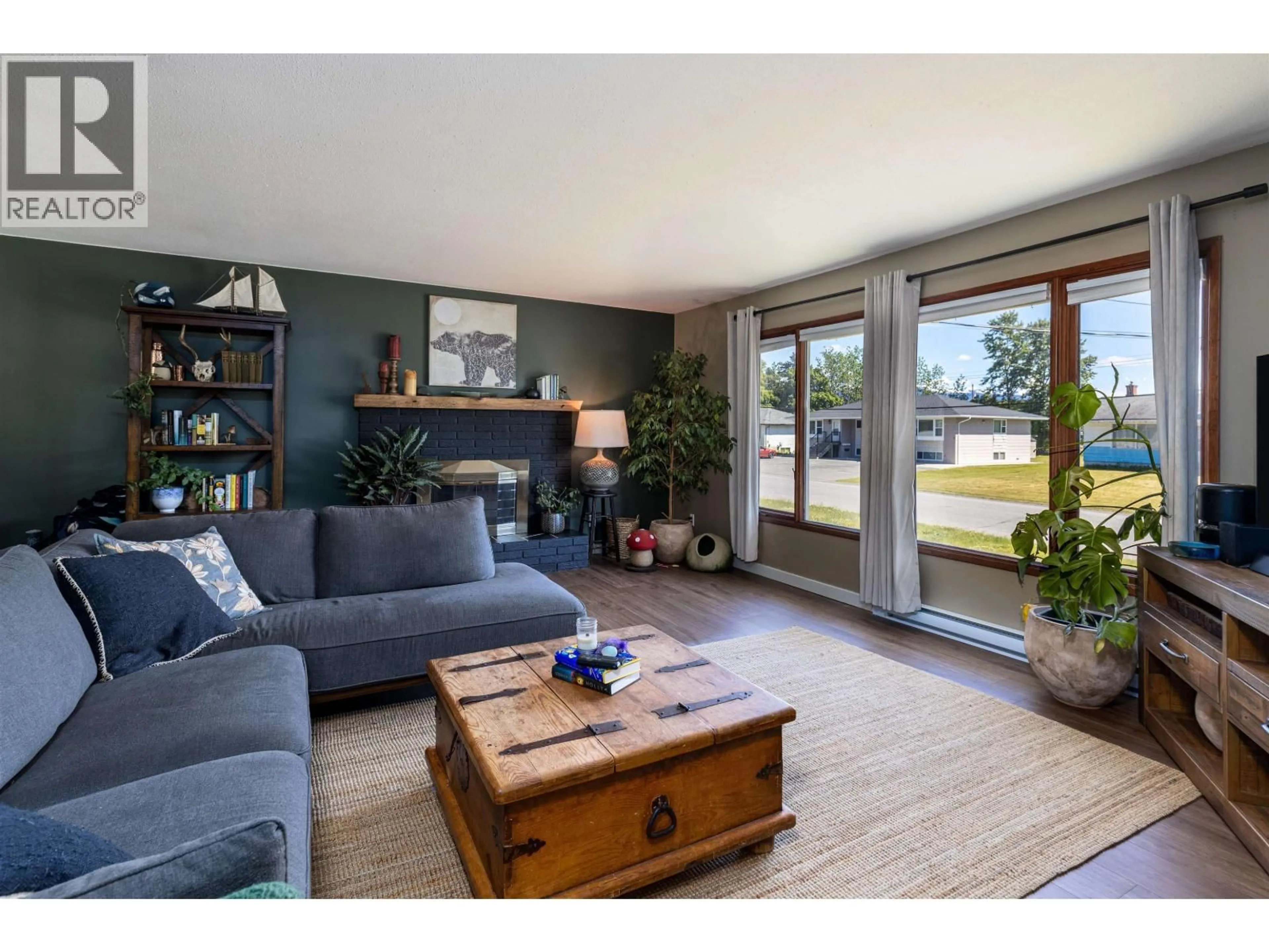 Living room with furniture, wood/laminate floor for 4924 LAZELLE AVENUE, Terrace British Columbia V8G1T7