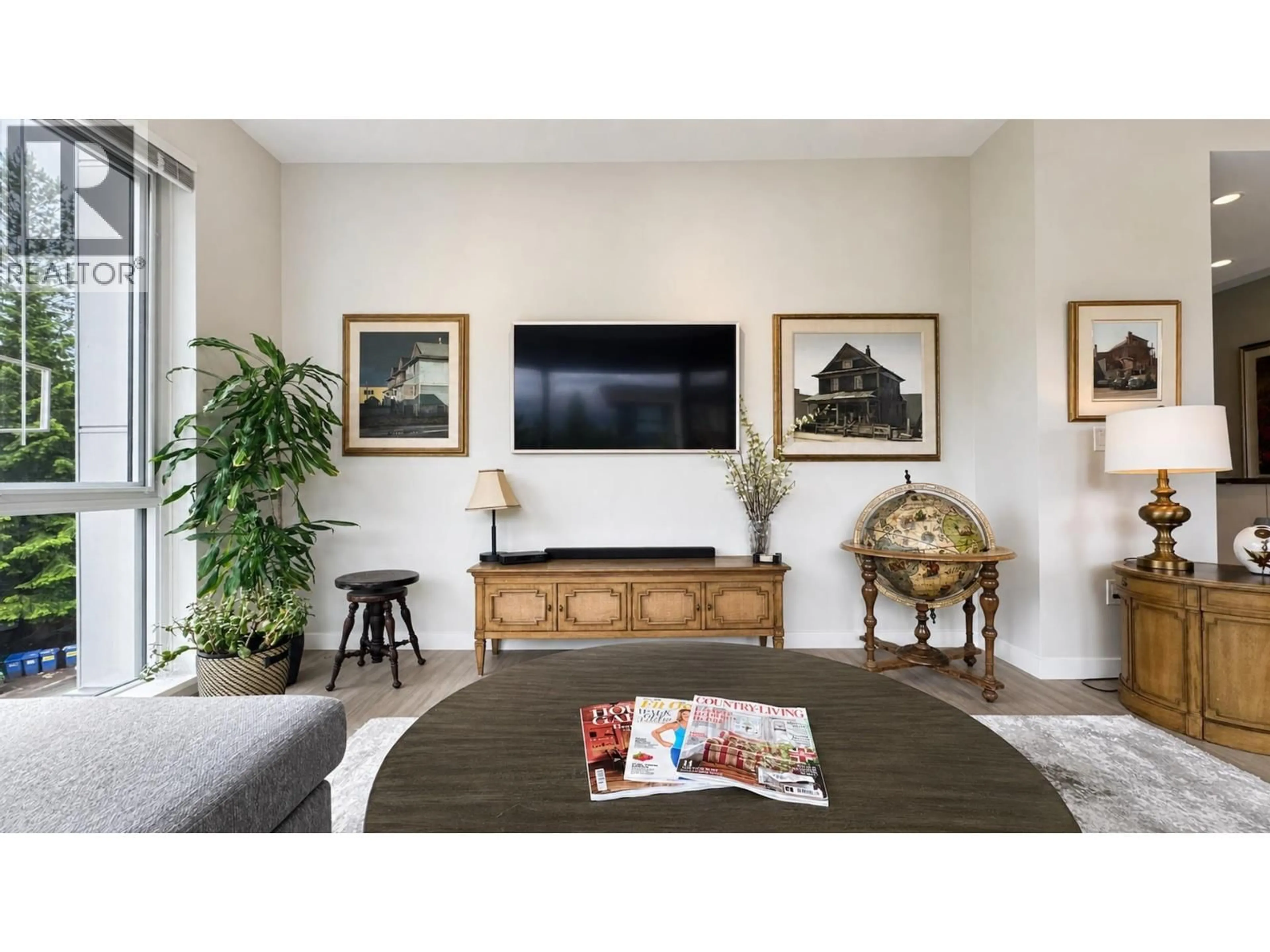 Living room with furniture, wood/laminate floor for 301 - 2651 LIBRARY LANE, North Vancouver British Columbia V7J0C1