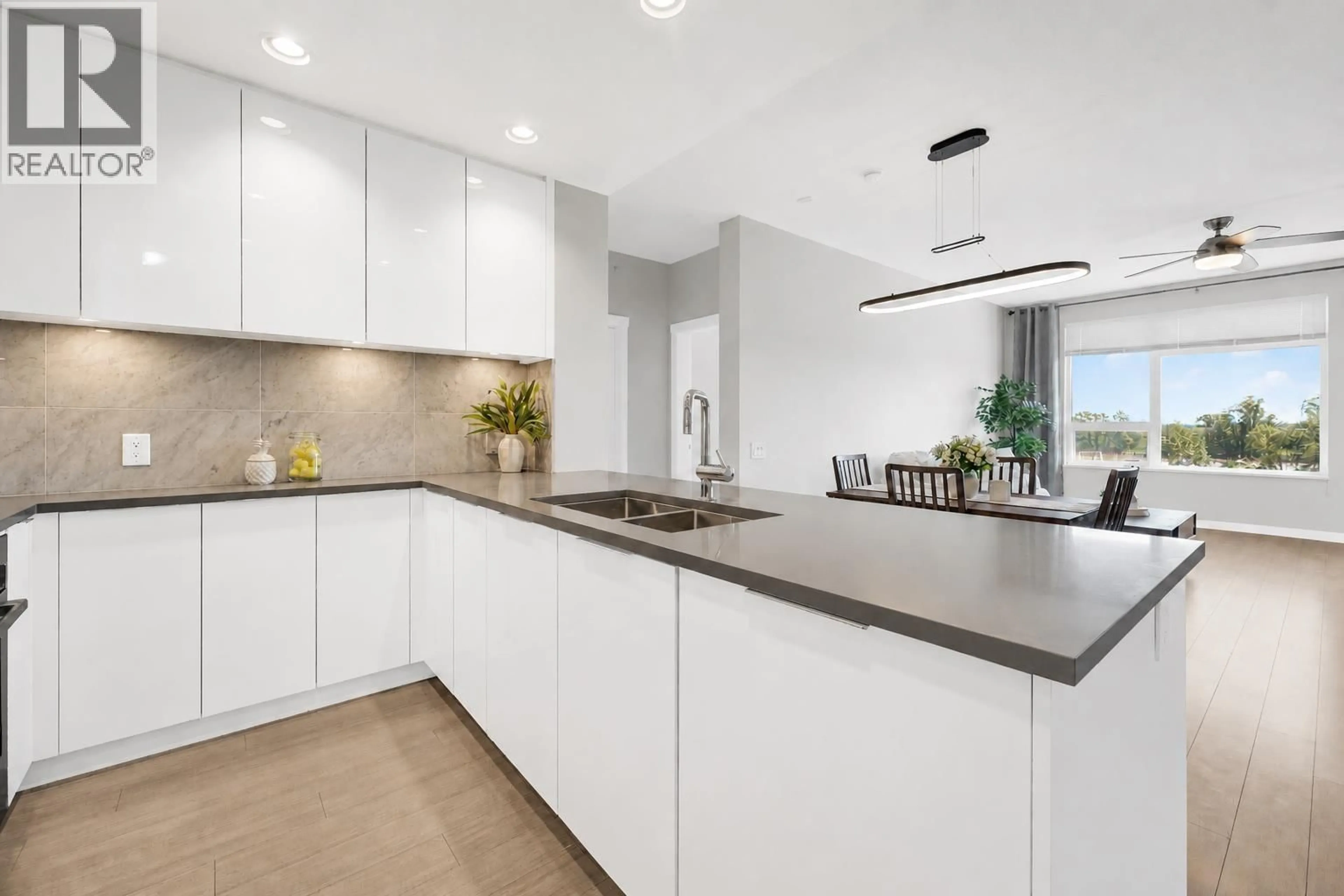 Contemporary kitchen, ceramic/tile floor for 604 - 3289 RIVERWALK AVENUE, Vancouver British Columbia V5S0G2