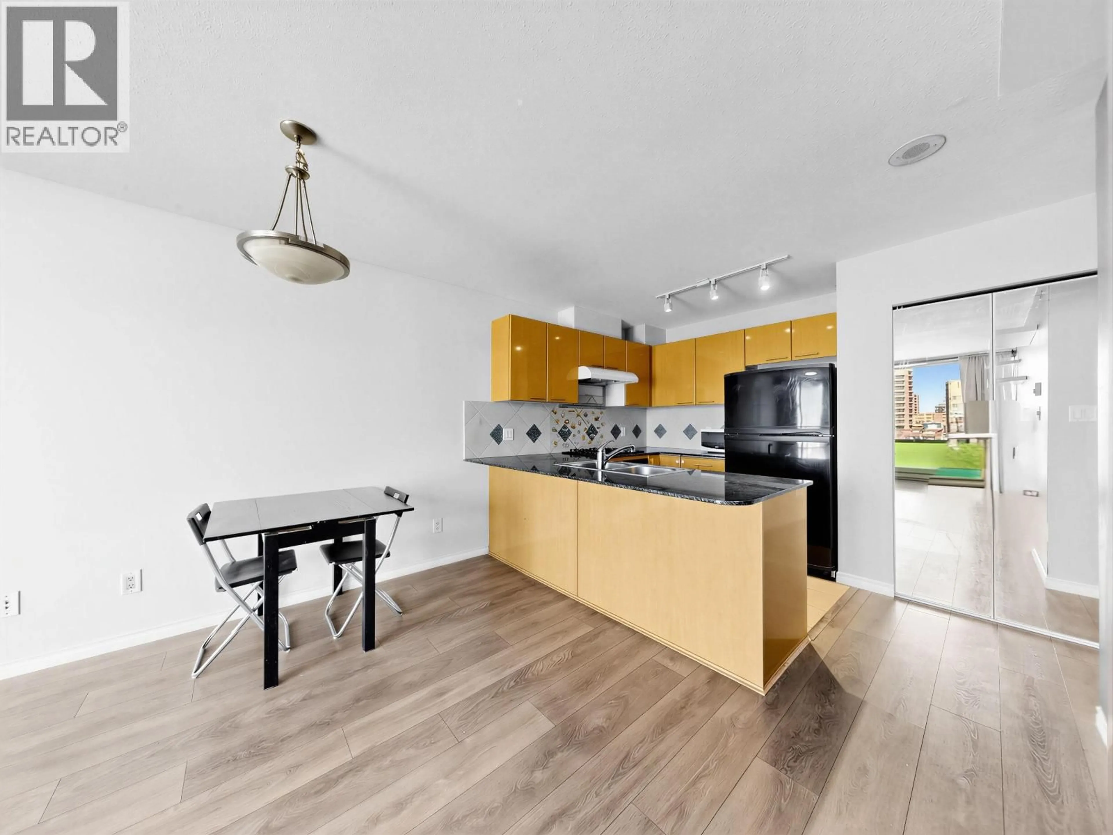 Open concept kitchen, unknown for 704 - 5933 COONEY ROAD, Richmond British Columbia V6X4H3