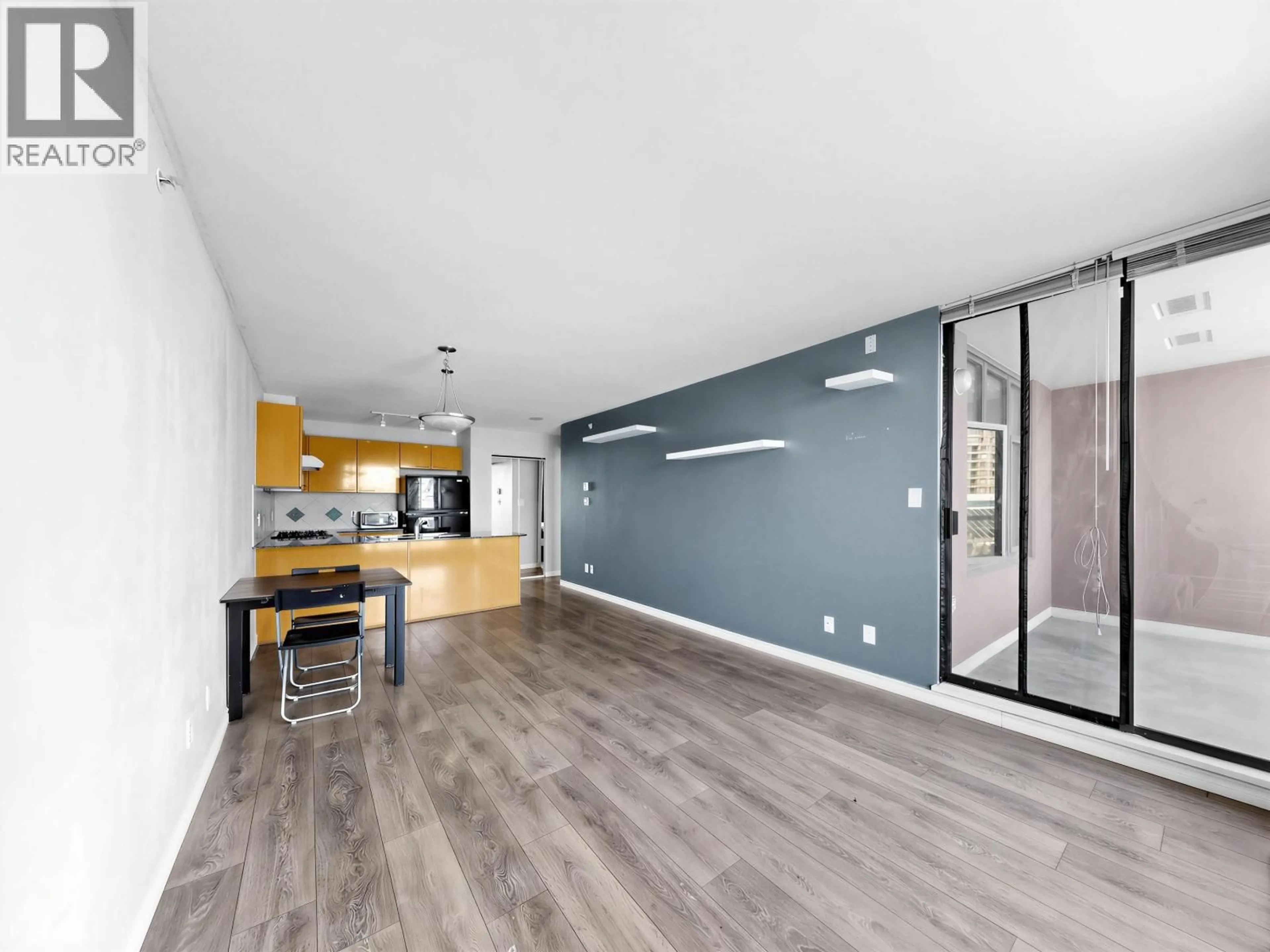Open concept kitchen, wood/laminate floor for 704 - 5933 COONEY ROAD, Richmond British Columbia V6X4H3