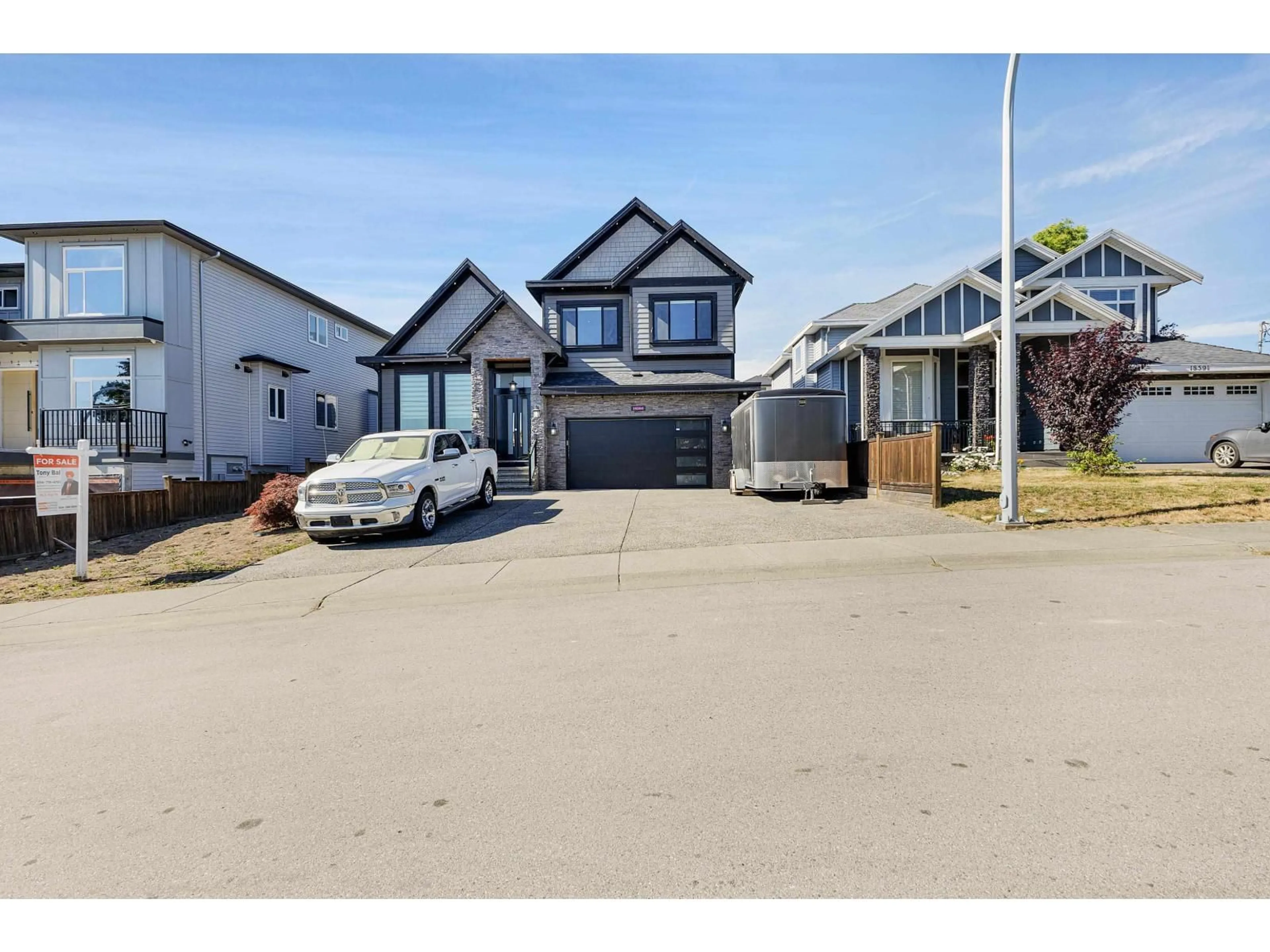 A pic from outside/outdoor area/front of a property/back of a property/a pic from drone, street for 18585 56 AVENUE, Surrey British Columbia V3S9E5