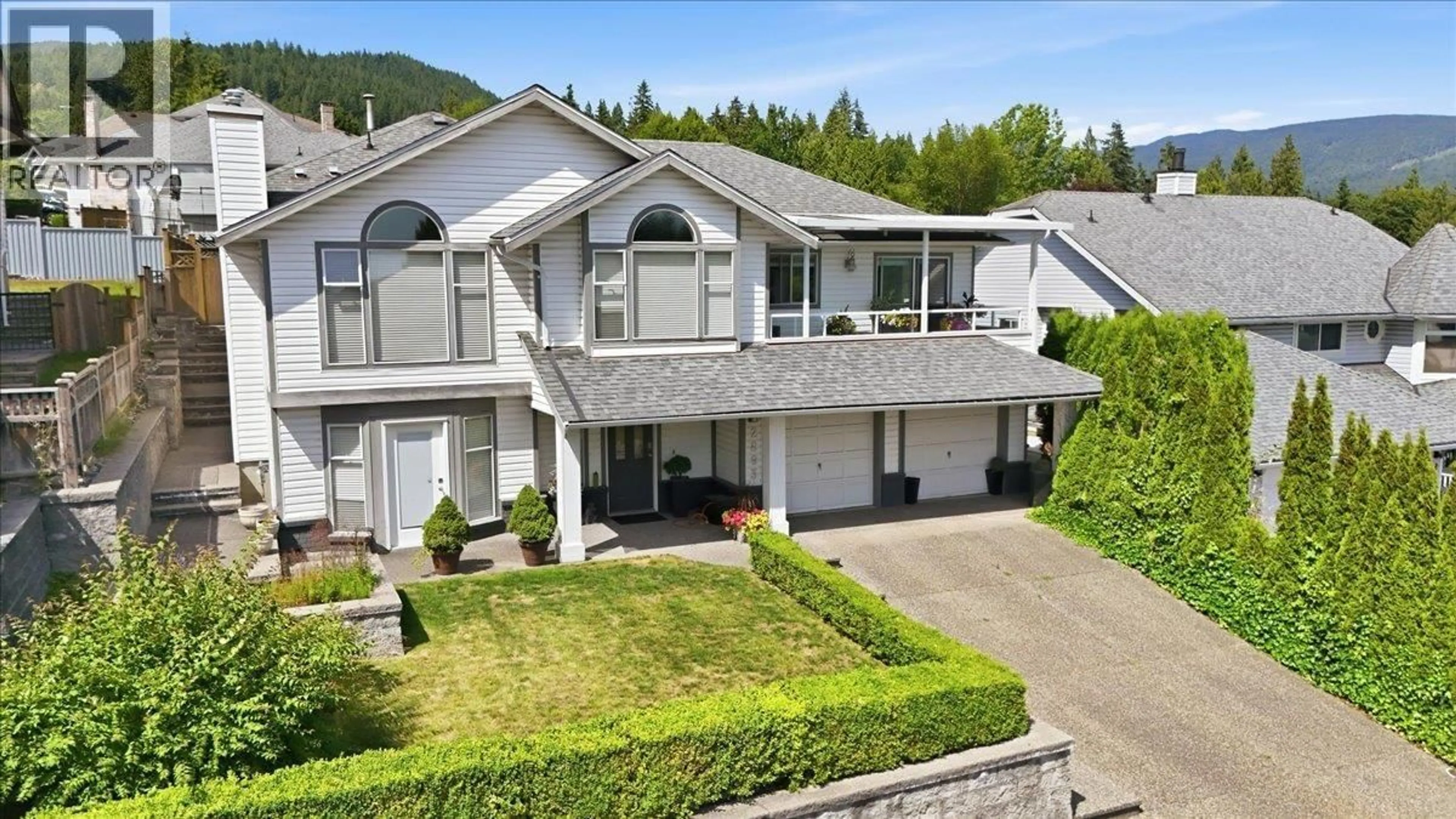Home with vinyl exterior material, mountain view for 2893 DELAHAYE DRIVE, Coquitlam British Columbia V3B7A4