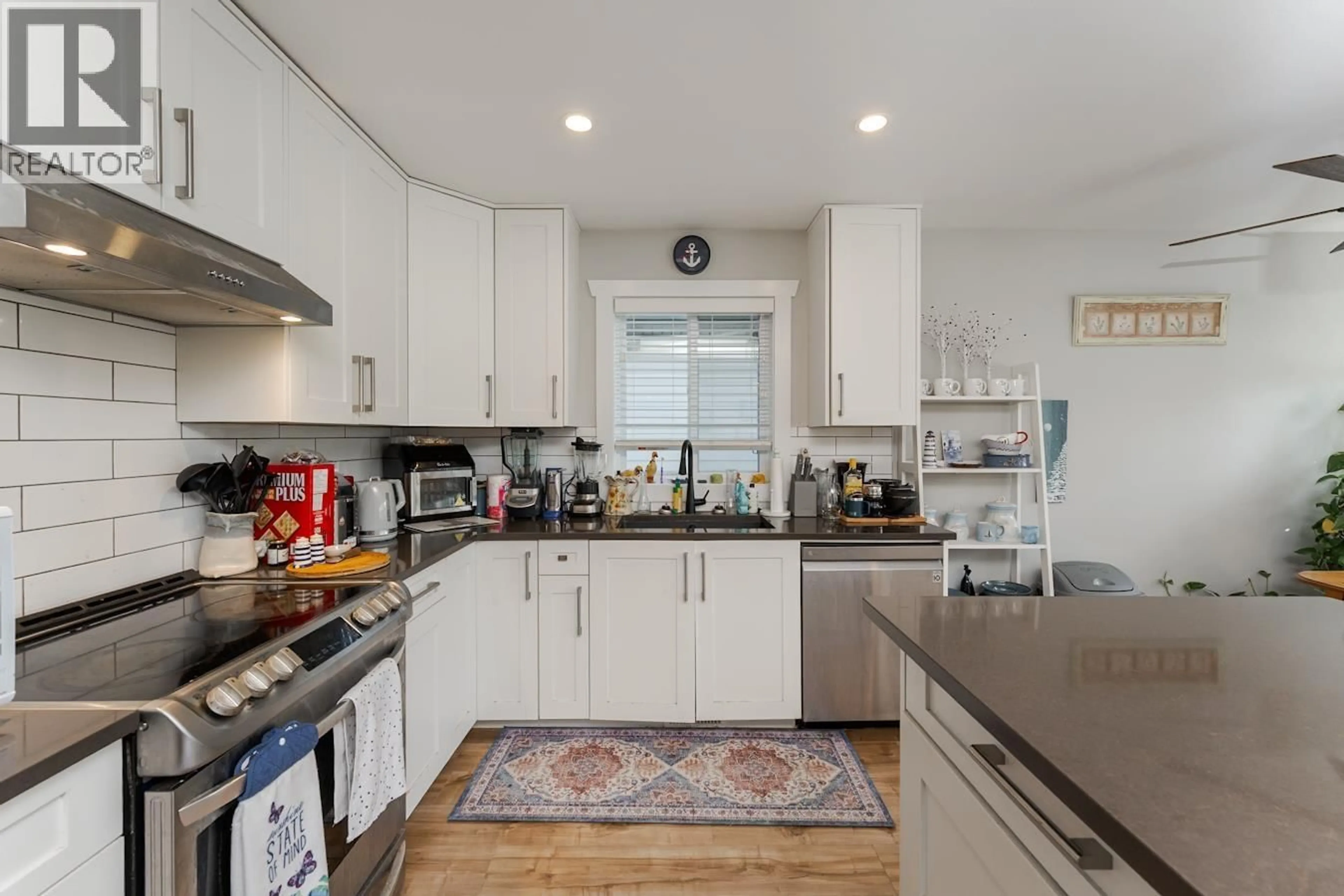 Open concept kitchen, unknown for 1648 9TH AVENUE, Prince George British Columbia V2L3S1