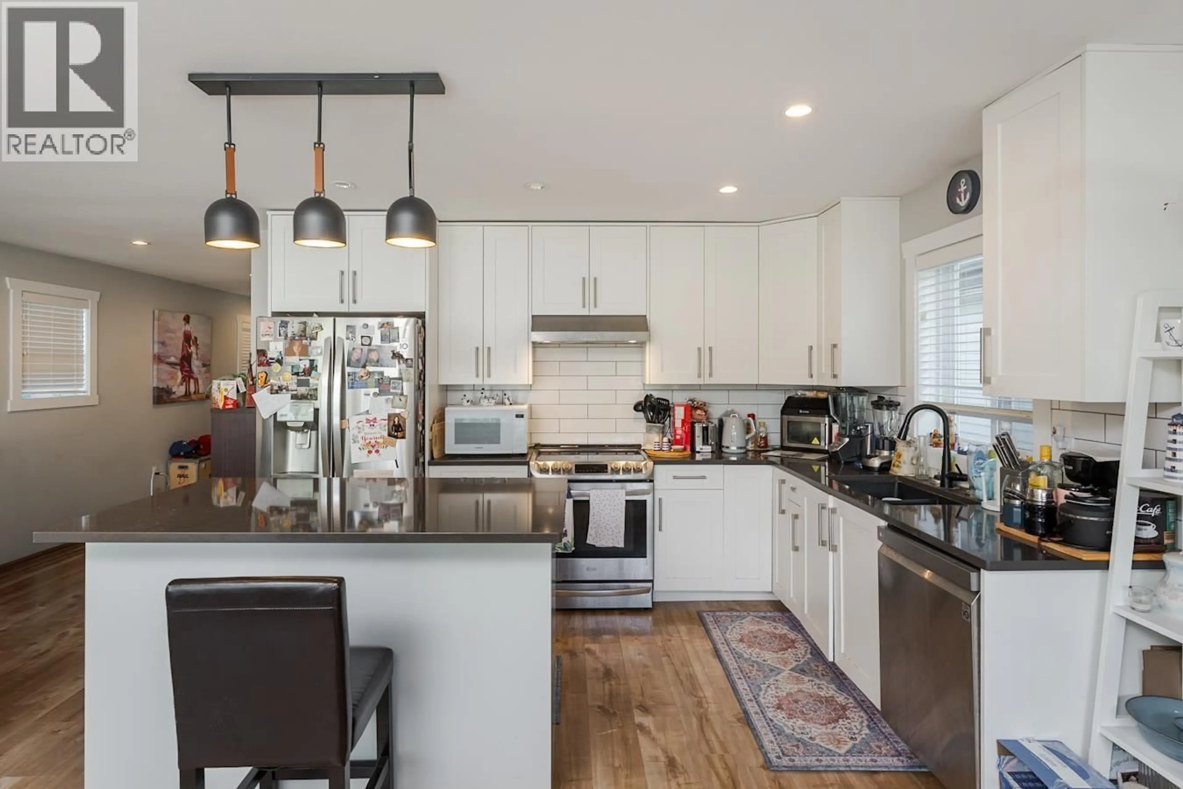 Open concept kitchen, unknown for 1648 9TH AVENUE, Prince George British Columbia V2L3S1