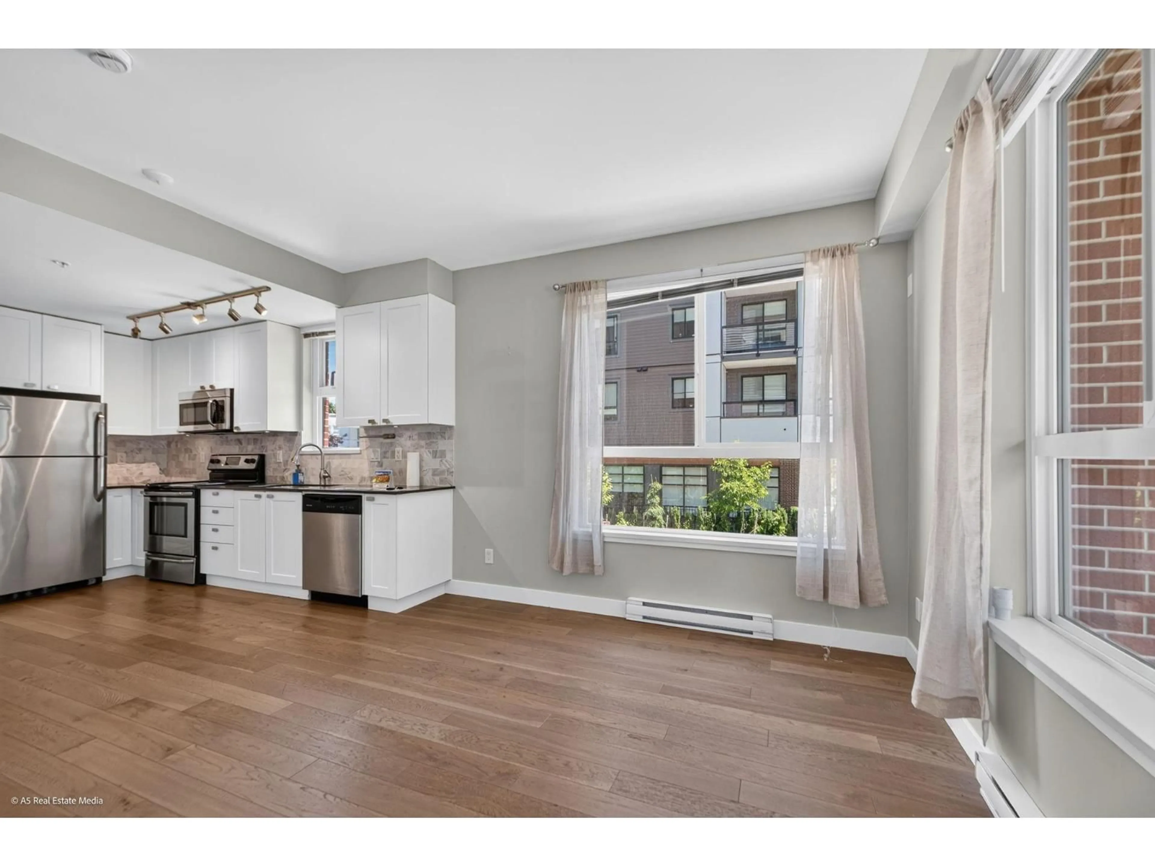 Open concept kitchen, unknown for 111 - 3080 GLADWIN ROAD, Abbotsford British Columbia V2T0G3