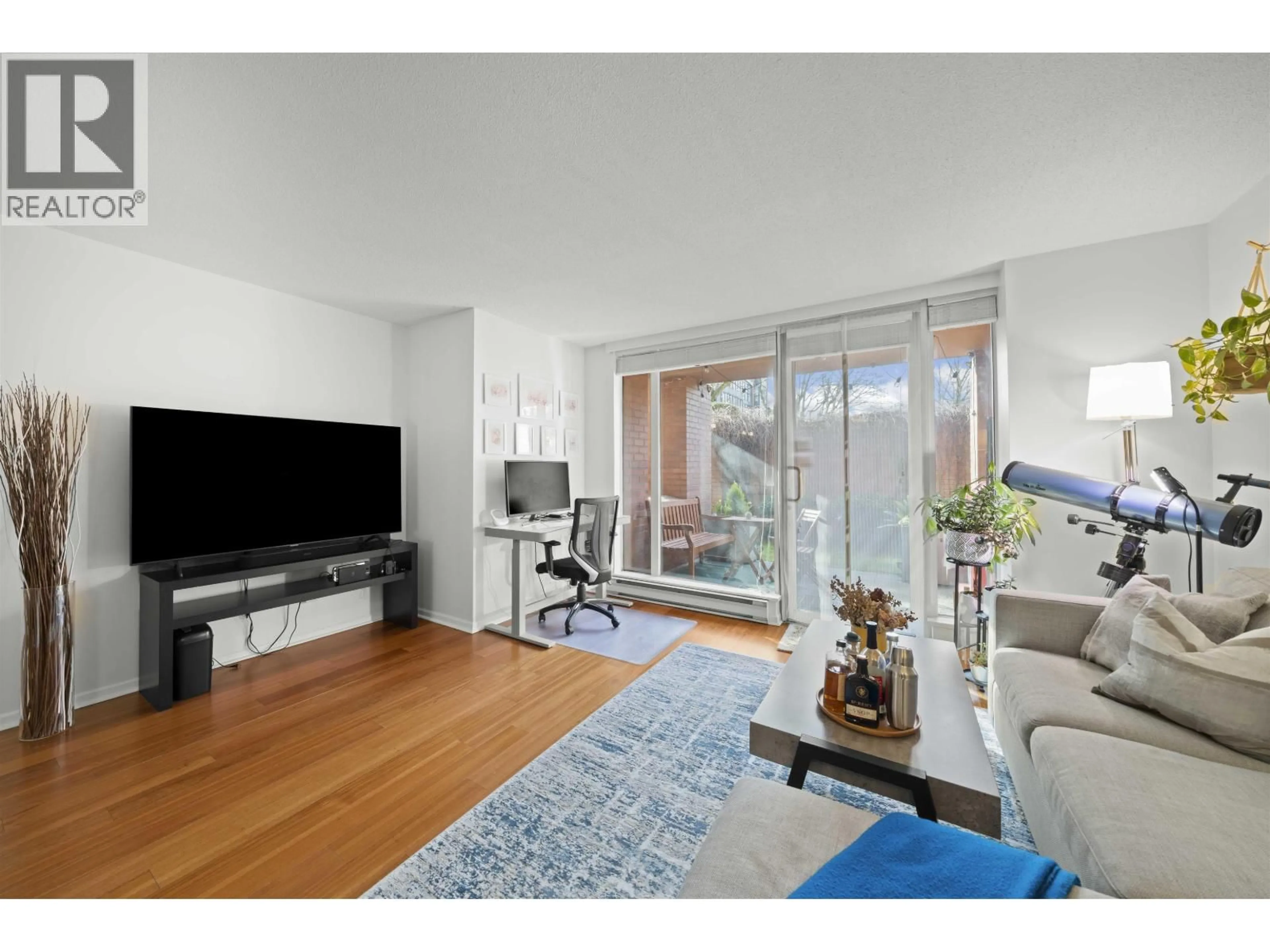 Living room with furniture, wood/laminate floor for 106 - 503 16TH AVENUE, Vancouver British Columbia V5Z4N3