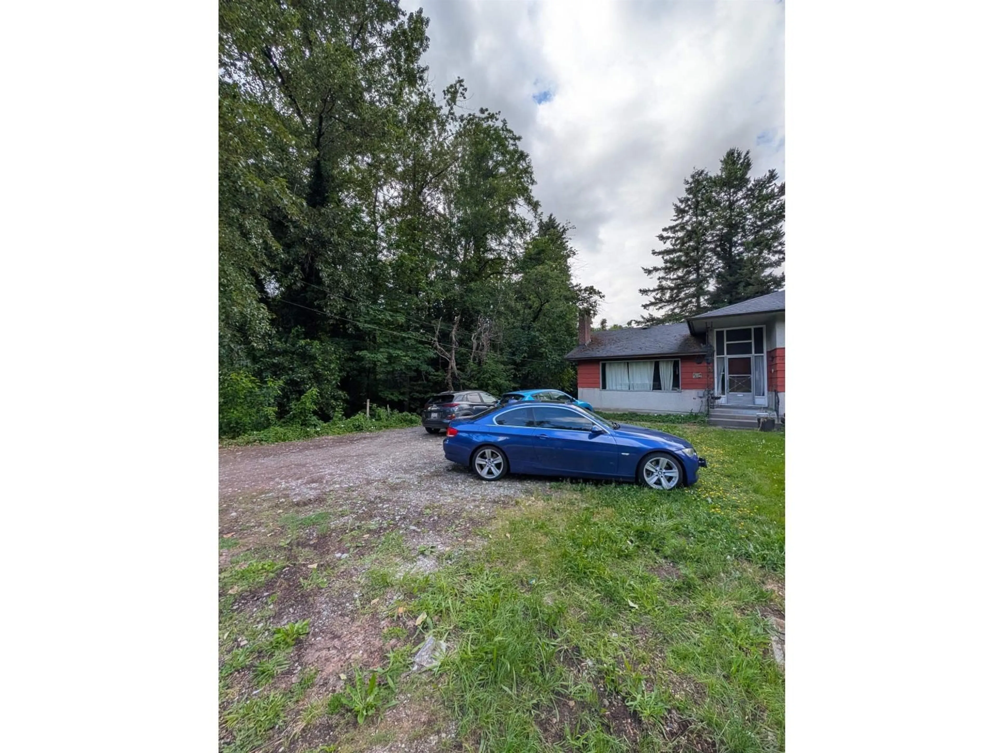 A pic from outside/outdoor area/front of a property/back of a property/a pic from drone, street for 13321 108 AVENUE, Surrey British Columbia V3T2J7