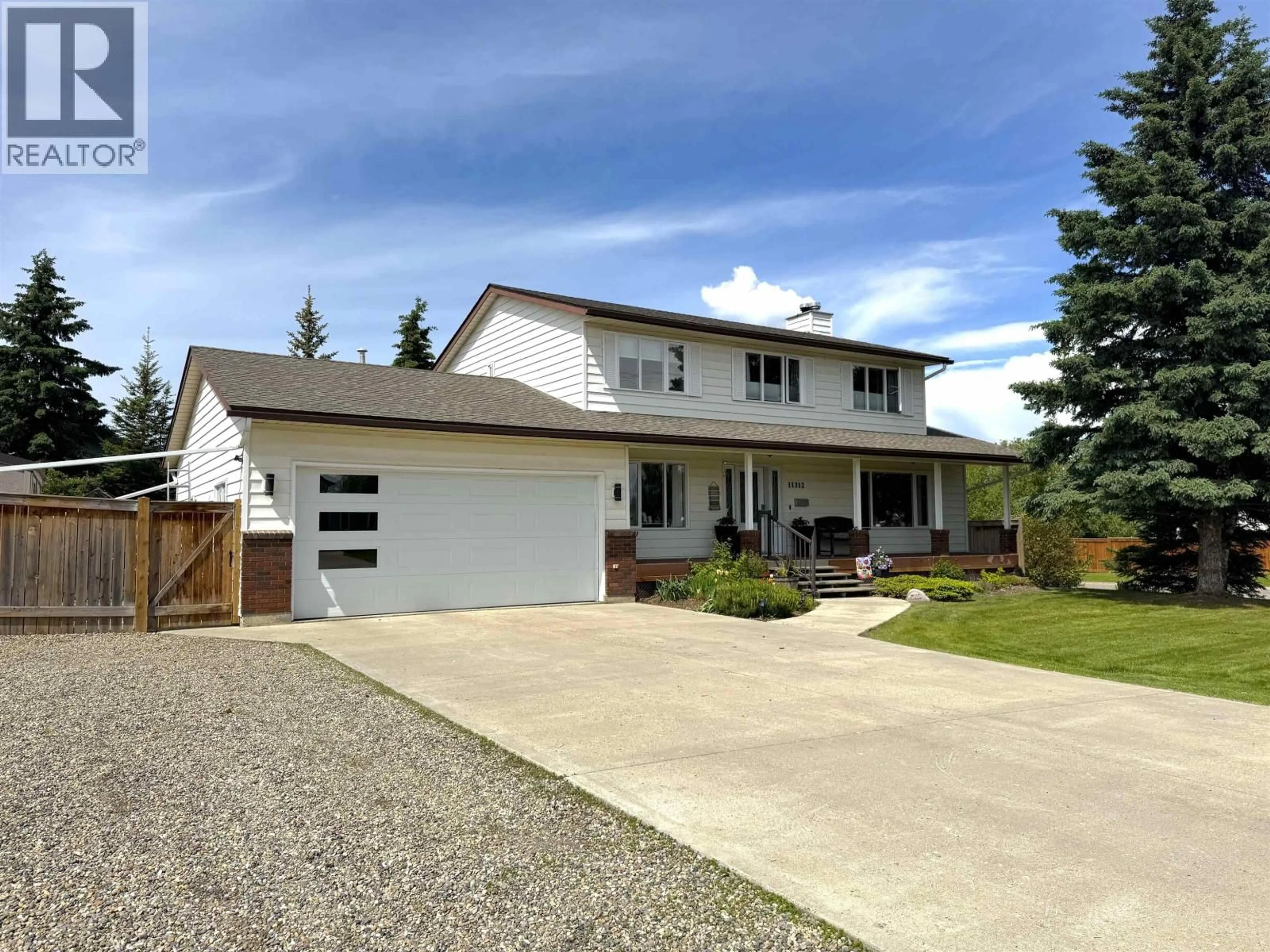 Home with vinyl exterior material, street for 11312 108 STREET, Fort St. John British Columbia V1J6H1