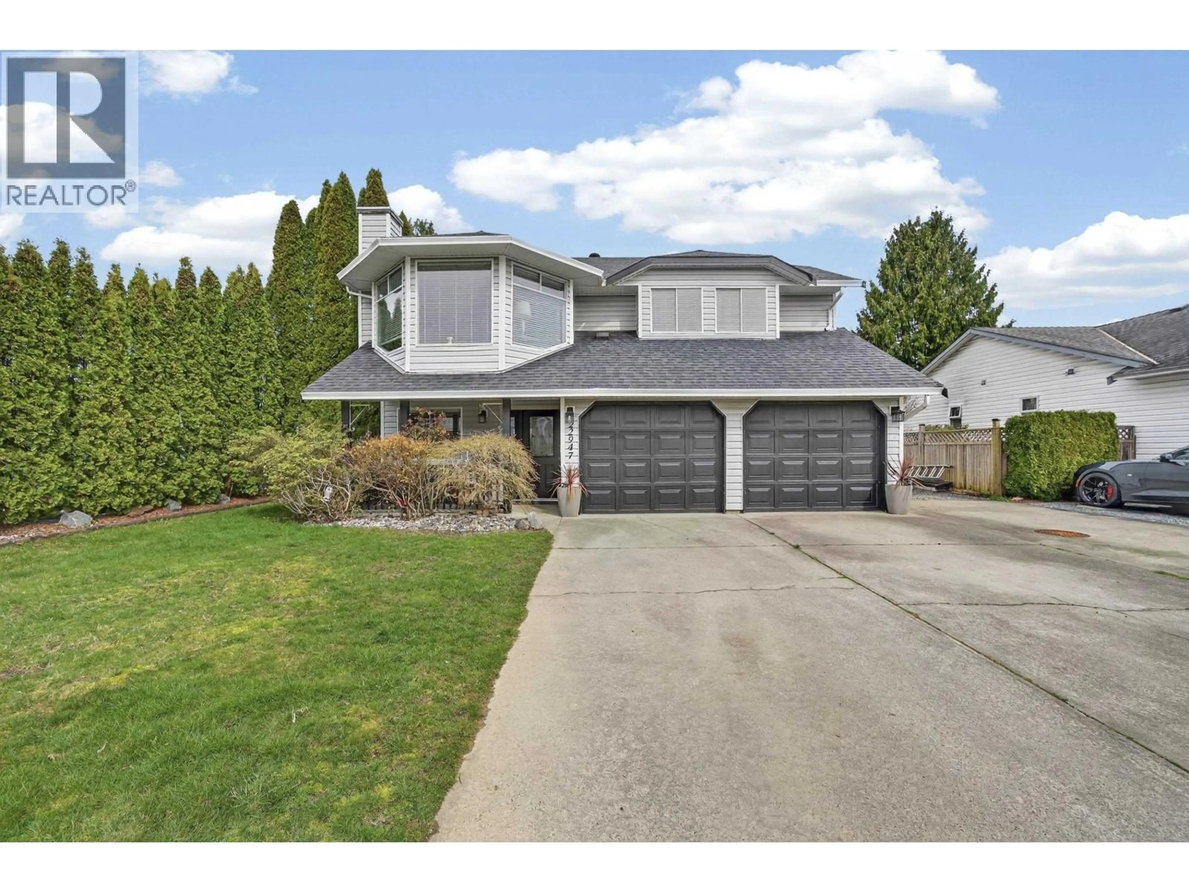 Home with vinyl exterior material, street for 22947 123B AVENUE, Maple Ridge British Columbia V2X0C4