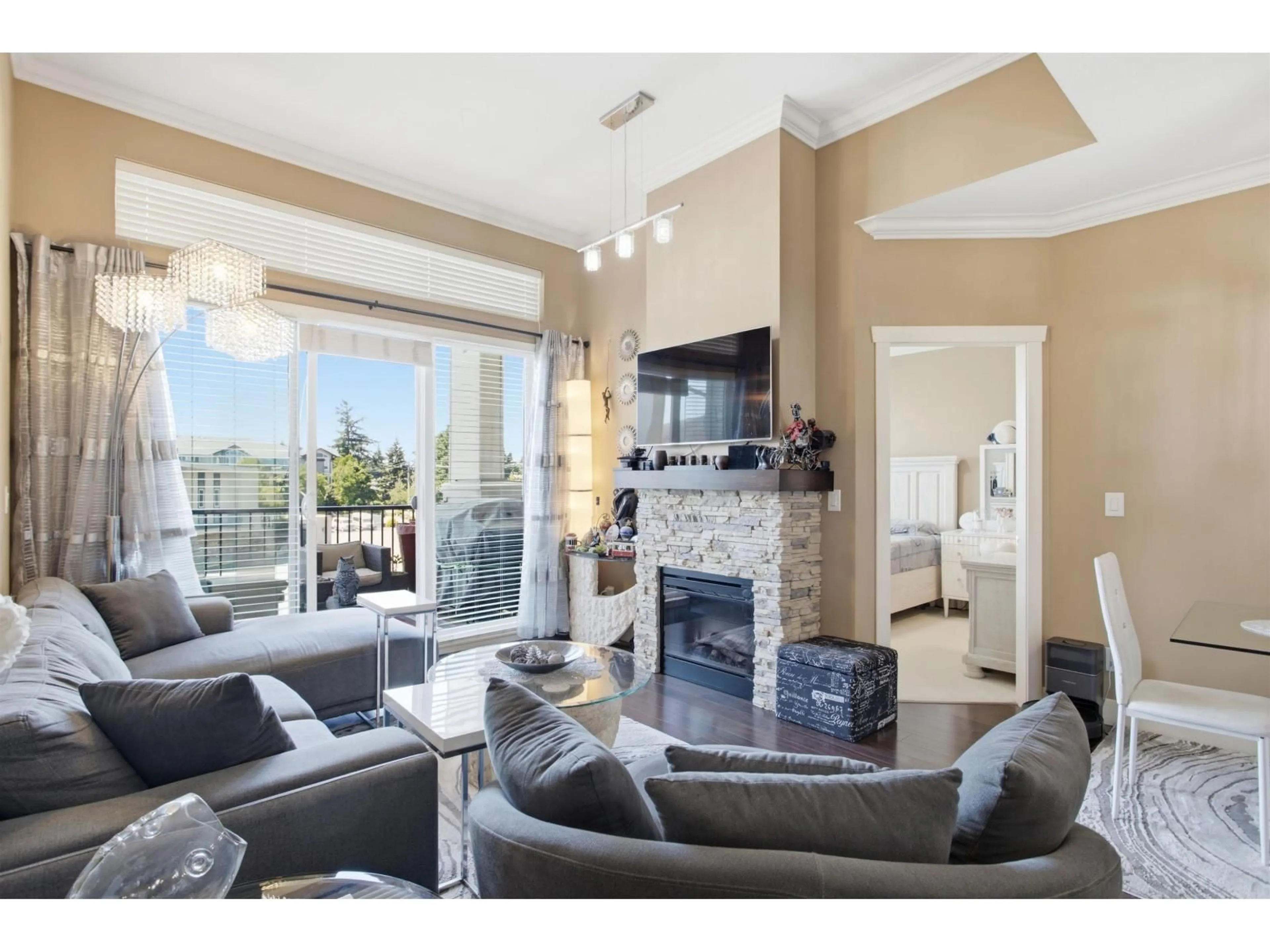 Living room with furniture, ceramic/tile floor for 413 - 3192 GLADWIN ROAD, Abbotsford British Columbia V2T6M9
