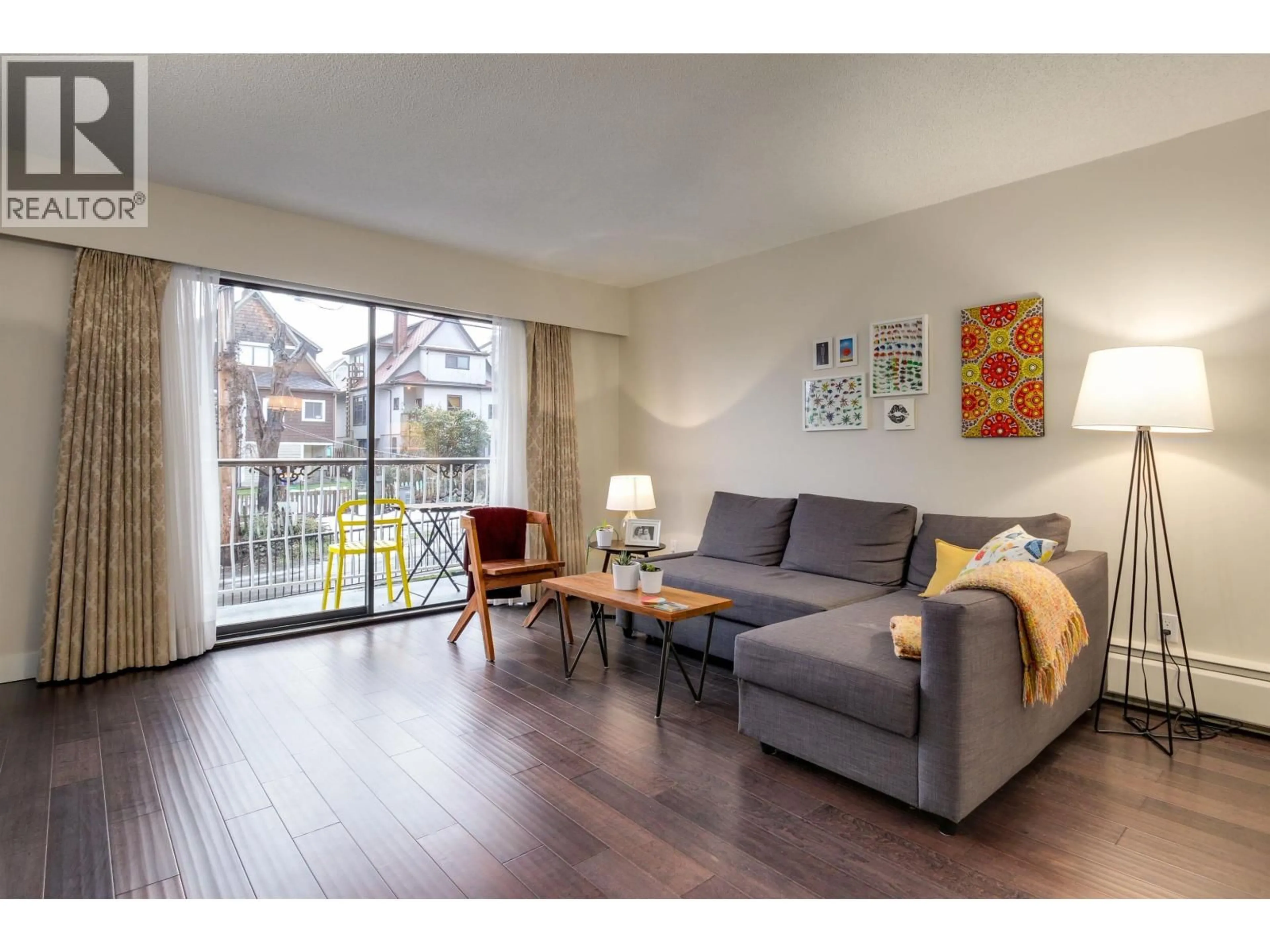 Living room with furniture, wood/laminate floor for 203 - 1611 3RD AVENUE, Vancouver British Columbia V5N1H1