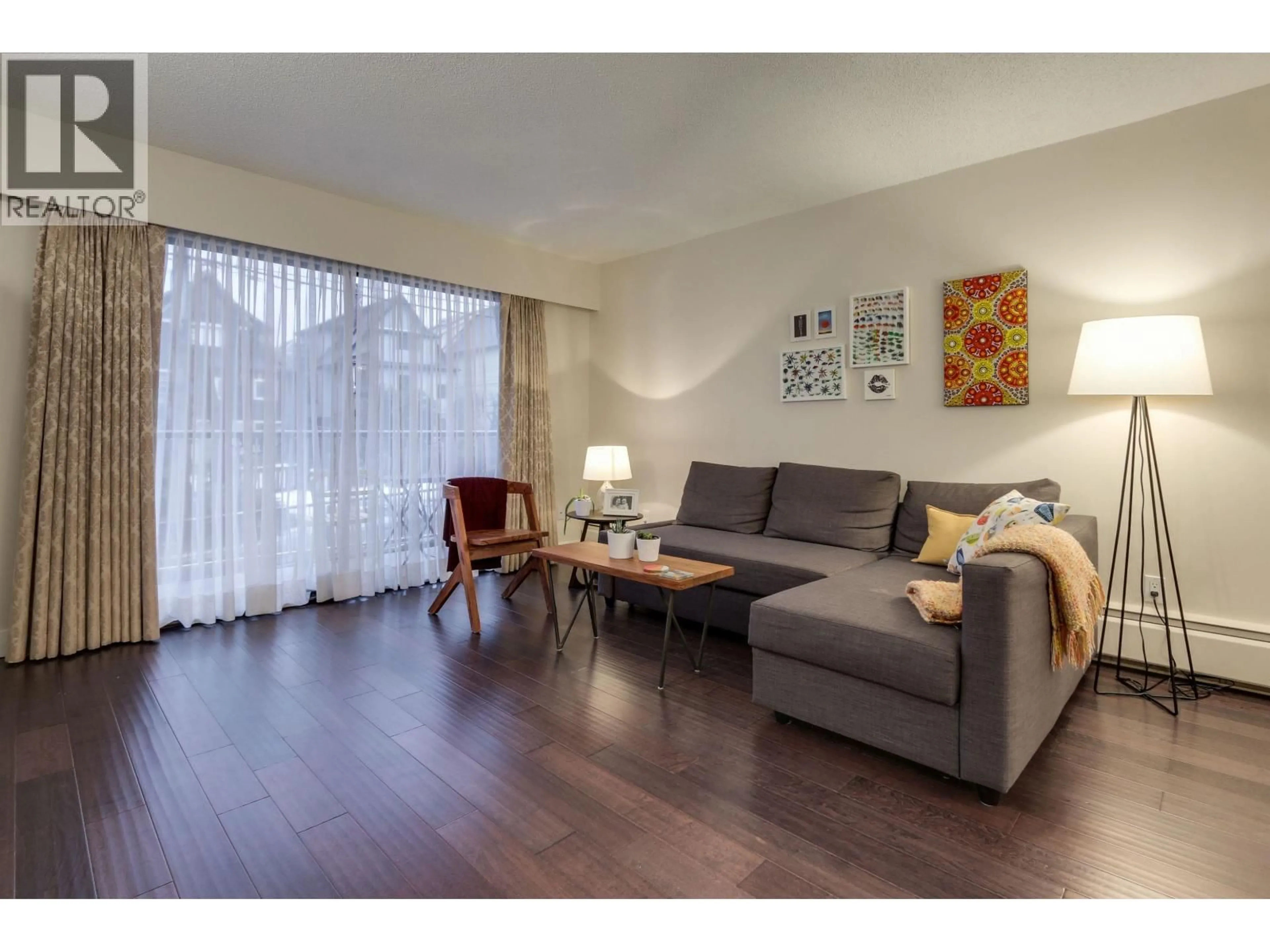 Living room with furniture, wood/laminate floor for 203 - 1611 3RD AVENUE, Vancouver British Columbia V5N1H1