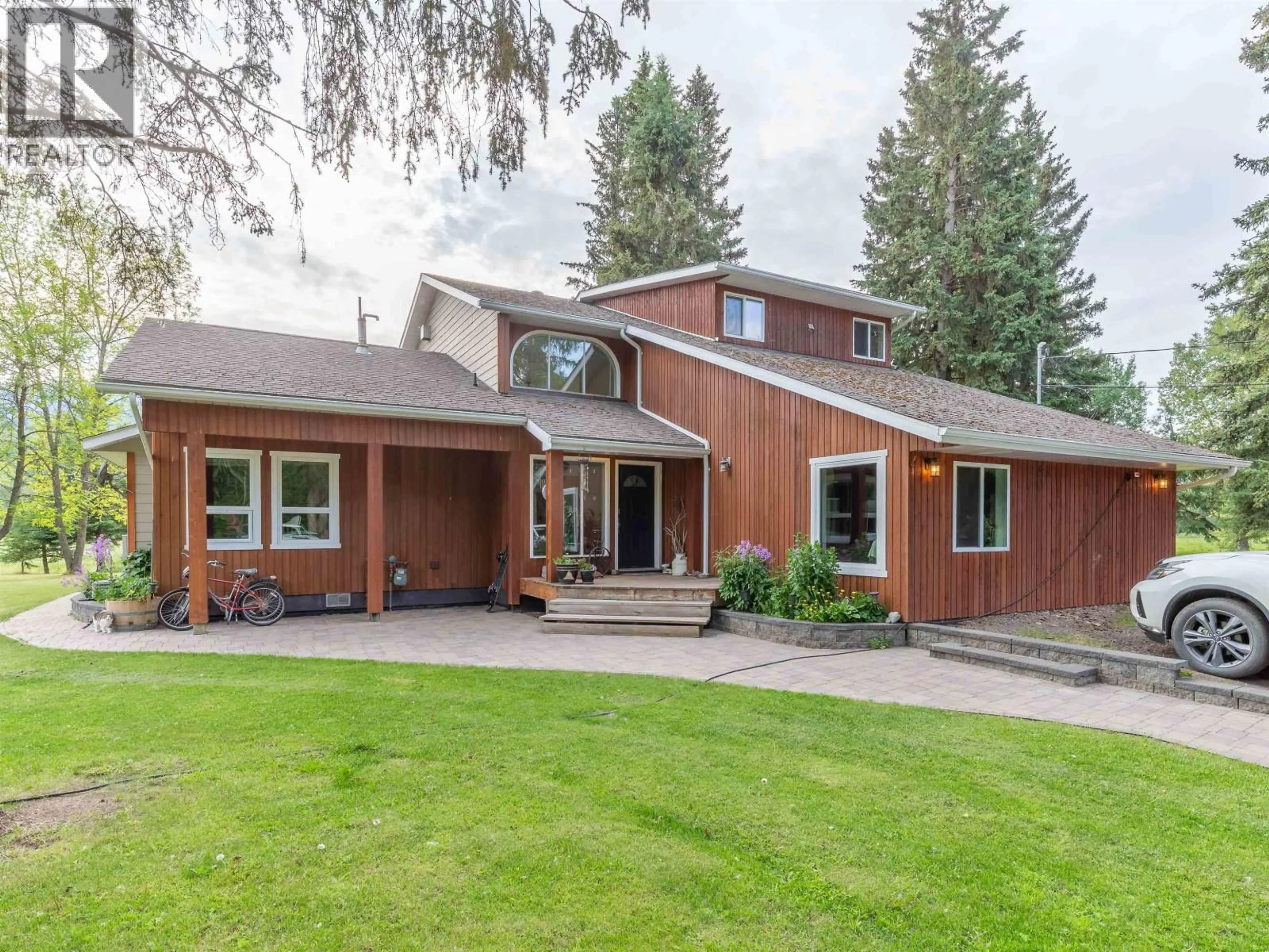 Home with vinyl exterior material, street for 1910 KIDD ROAD, Smithers British Columbia V0J2N6