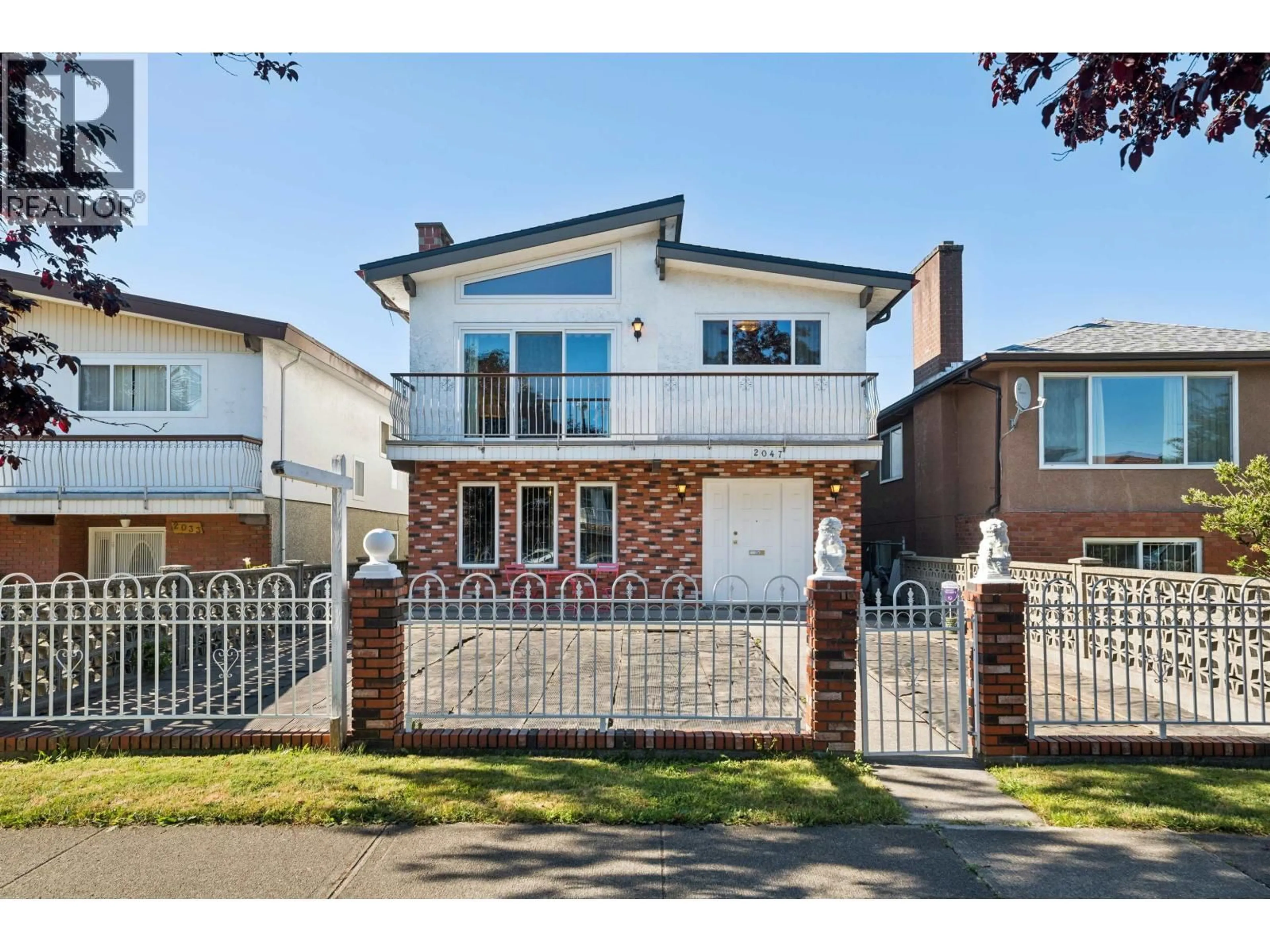 Home with brick exterior material, street for 2047 52ND AVENUE, Vancouver British Columbia V5P1W8