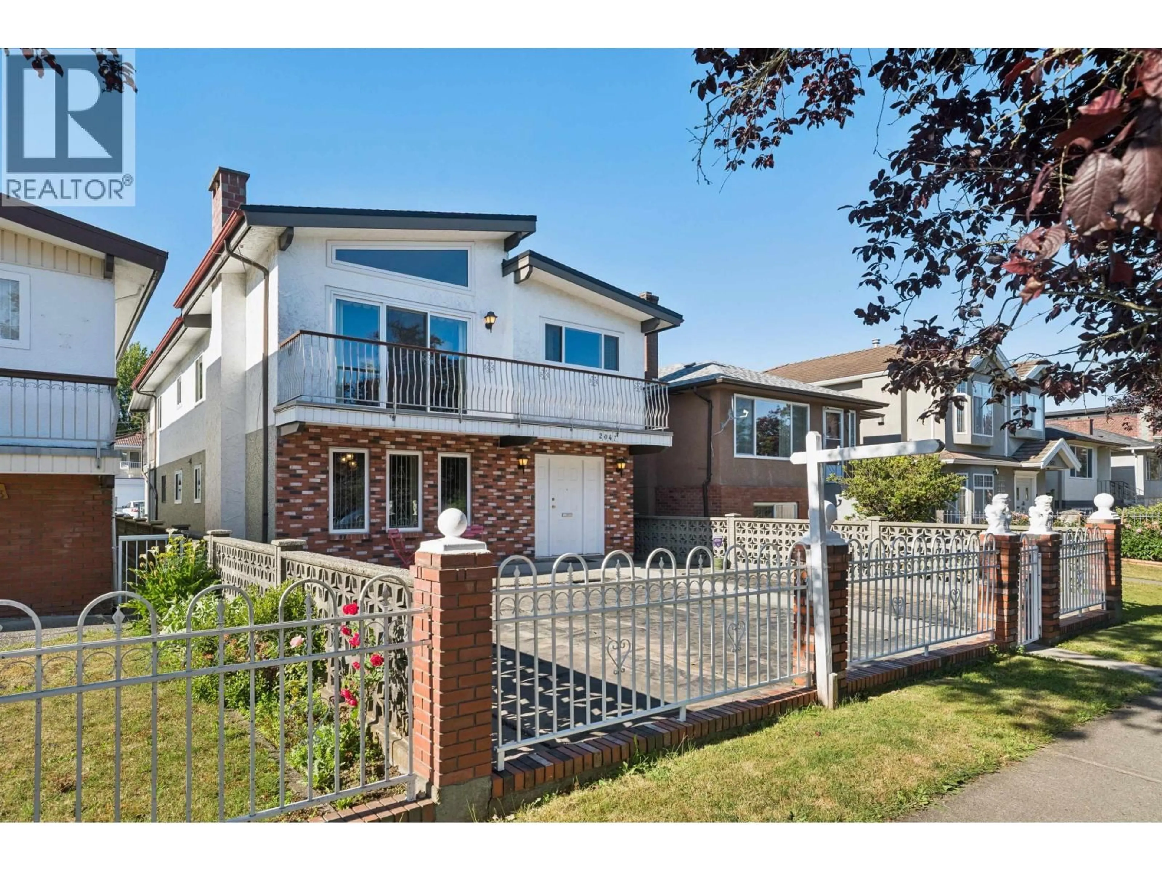 Home with brick exterior material, street for 2047 52ND AVENUE, Vancouver British Columbia V5P1W8