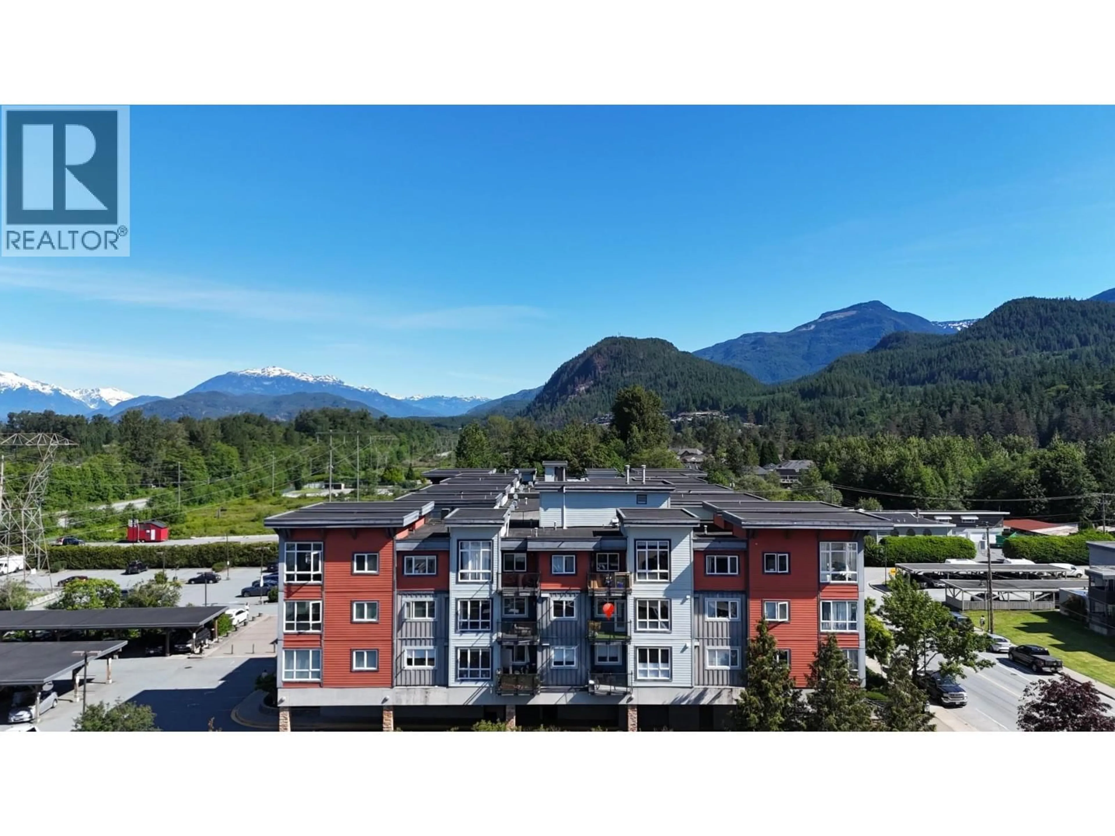 A pic from outside/outdoor area/front of a property/back of a property/a pic from drone, mountain view for 303 - 40437 TANTALUS ROAD, Squamish British Columbia V0N1T0