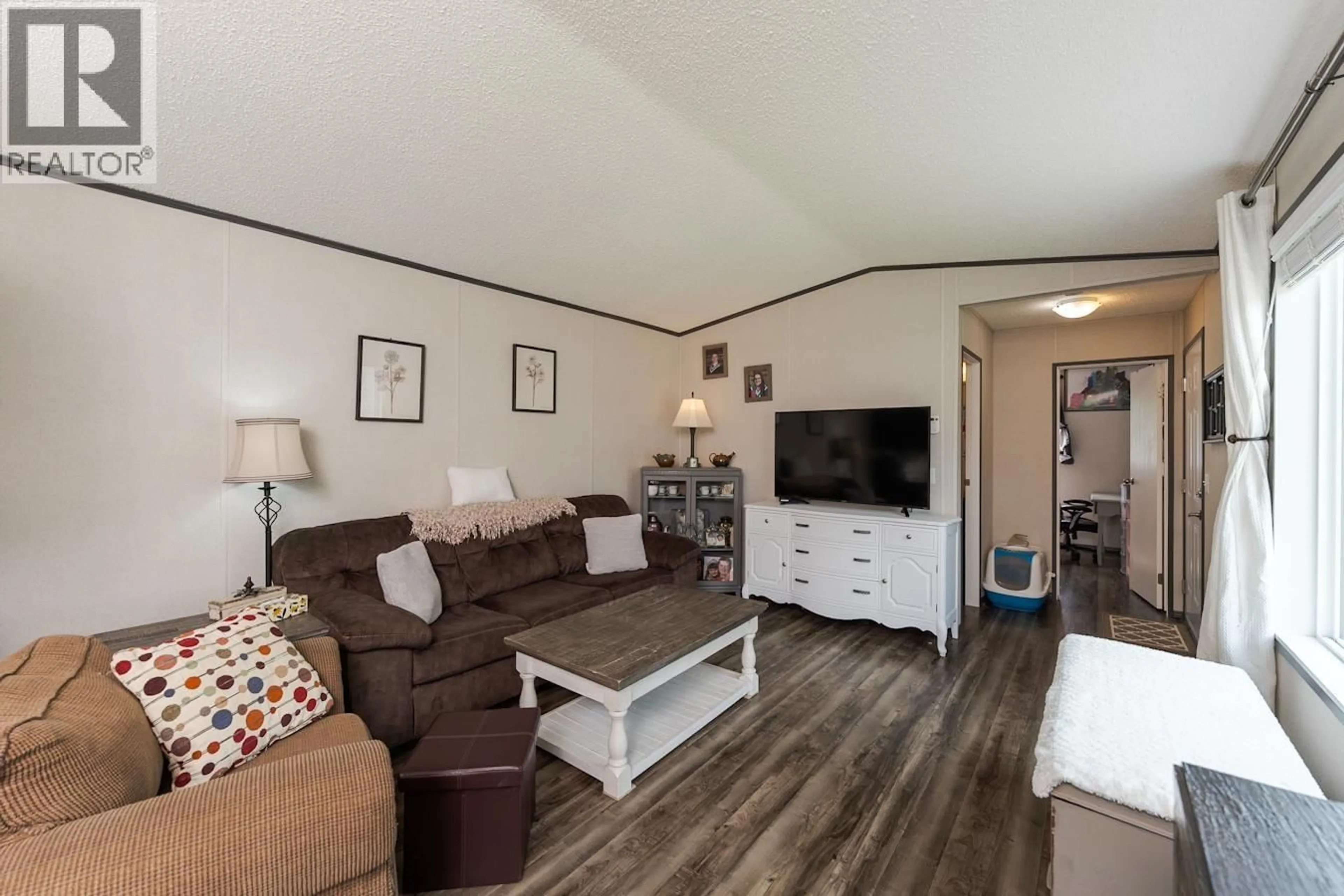 Living room with furniture, wood/laminate floor for 13 - 8474 BUNCE ROAD, Prince George British Columbia V2N6P1
