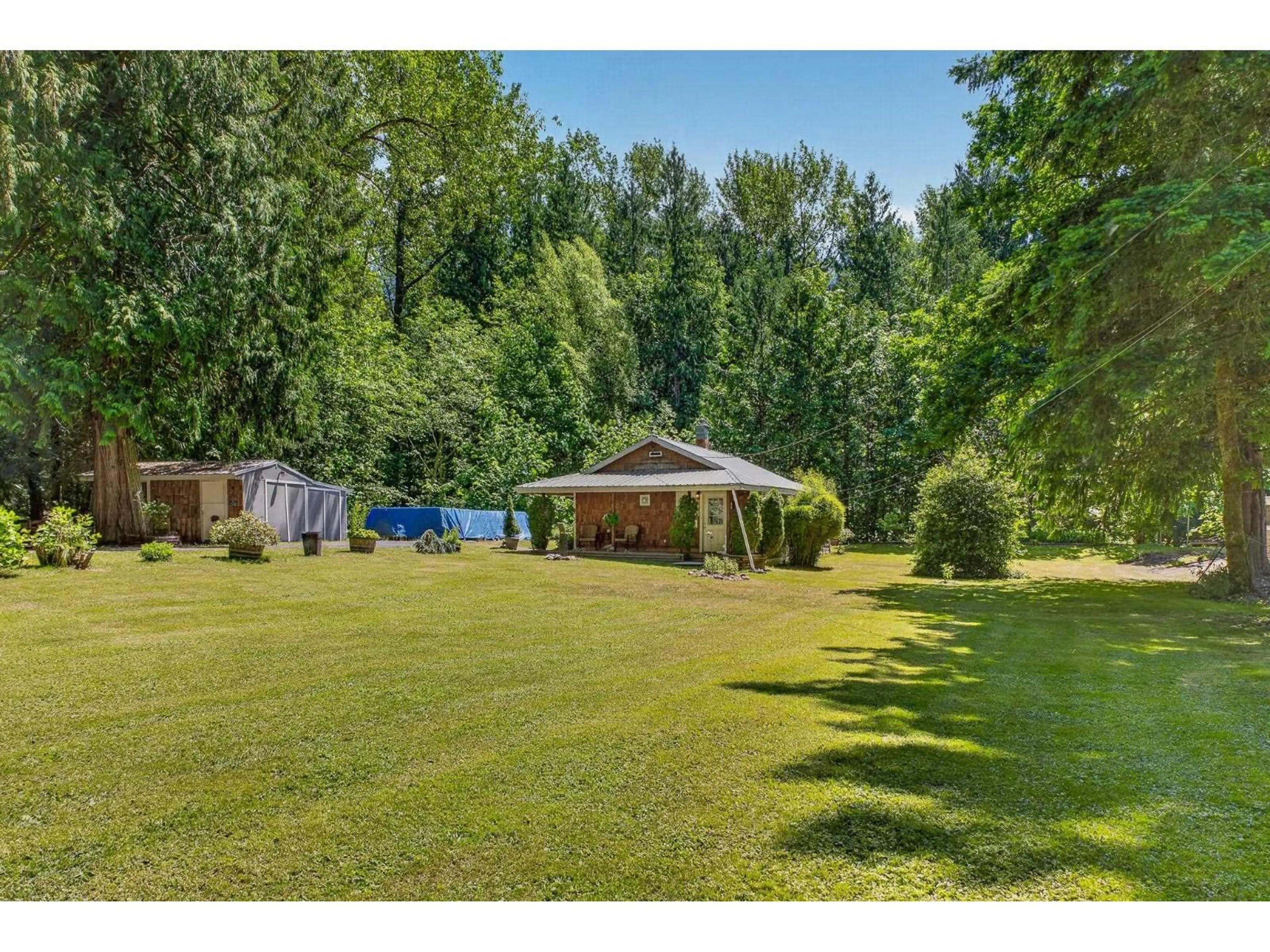 A pic from outside/outdoor area/front of a property/back of a property/a pic from drone, forest/trees view for 50994 O'BYRNE ROAD, Chilliwack British Columbia V4Z1B6