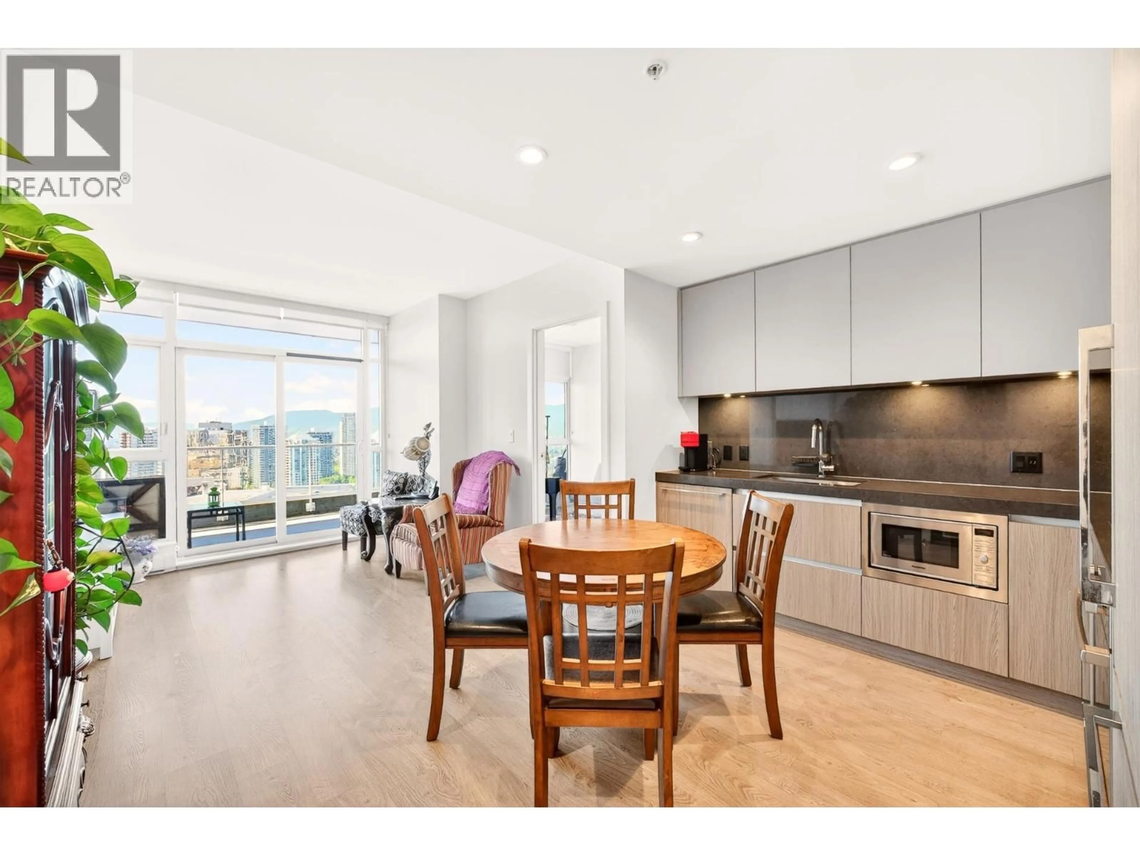 Open concept kitchen, wood/laminate floor for 2103 - 6080 MCKAY AVENUE, Burnaby British Columbia V5H0J4