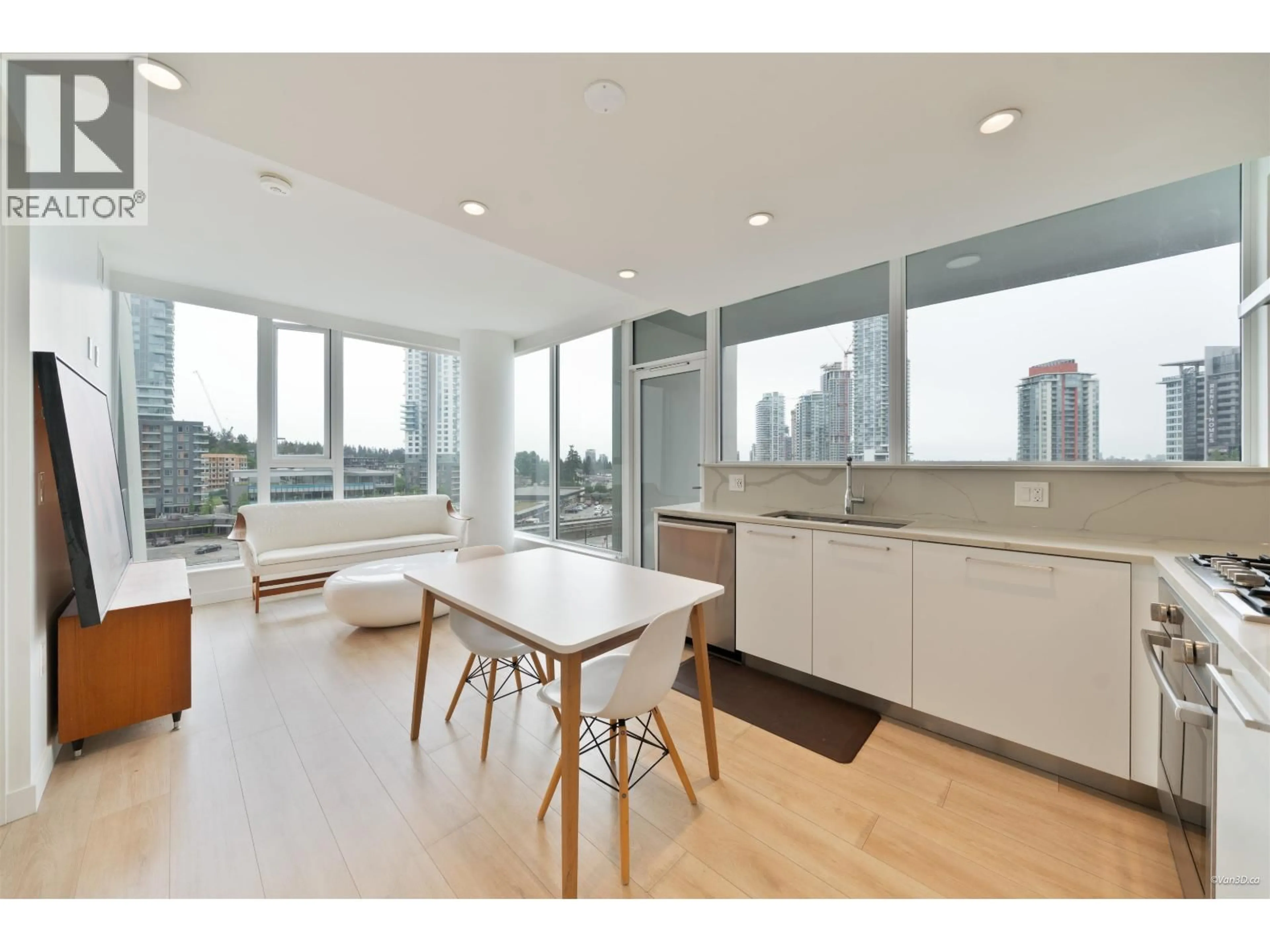 Open concept kitchen, wood/laminate floor for 510 - 567 CLARKE ROAD, Coquitlam British Columbia V3J0K7