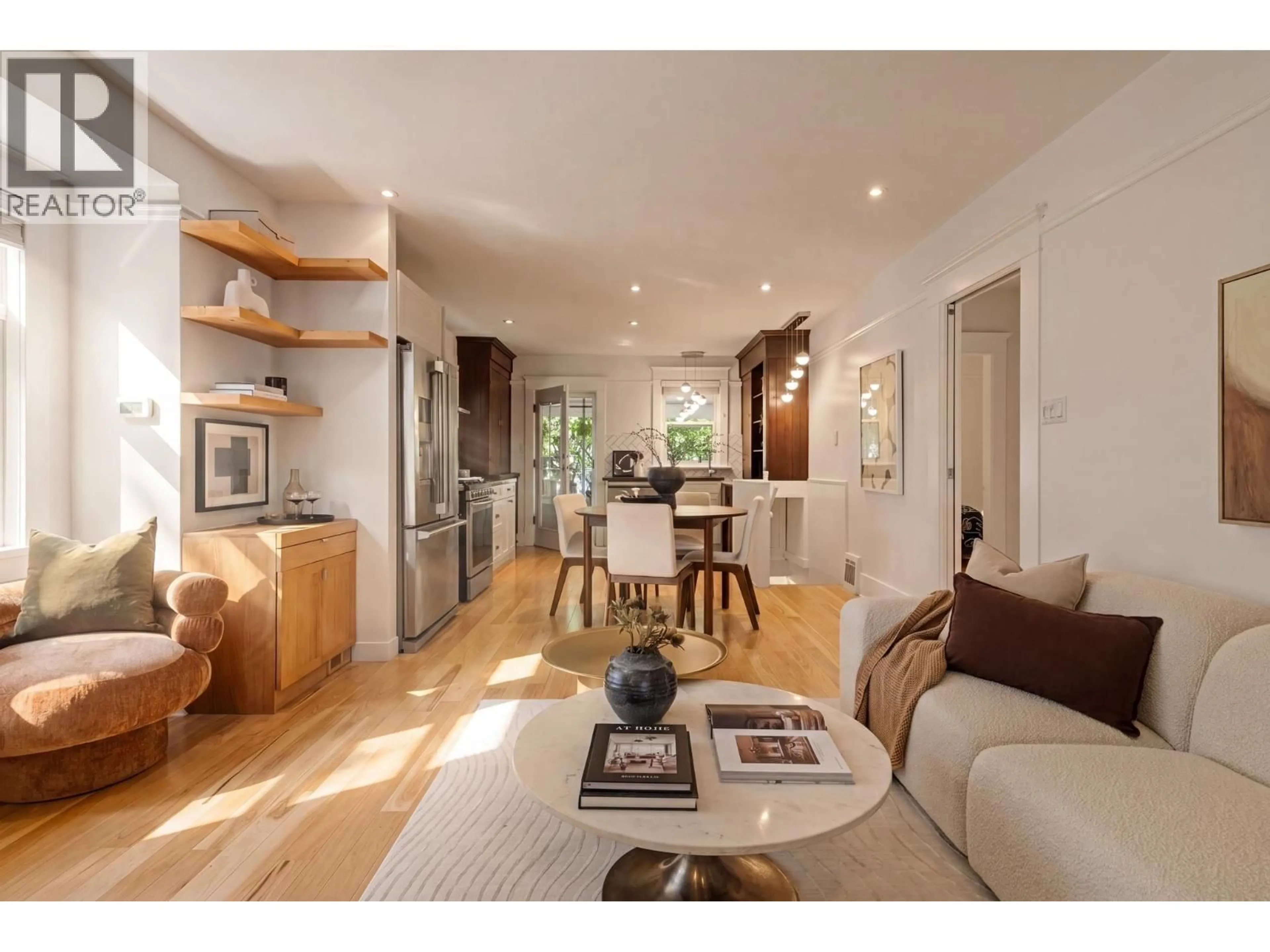 Living room with furniture, wood/laminate floor for 1859 SEMLIN DRIVE, Vancouver British Columbia V5N4P9