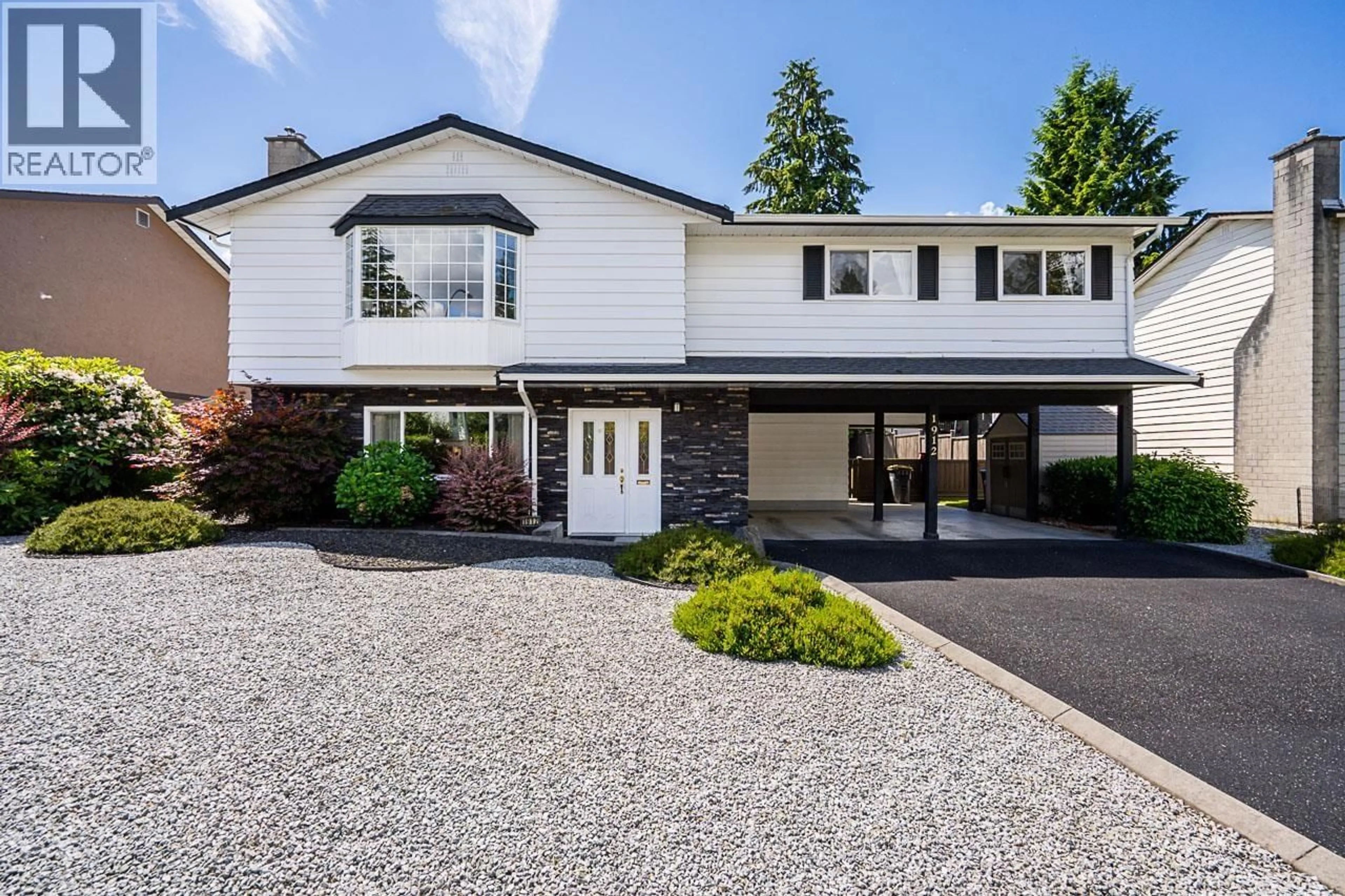 Home with vinyl exterior material, street for 1912 MERCER AVENUE, Port Coquitlam British Columbia V3C4C8