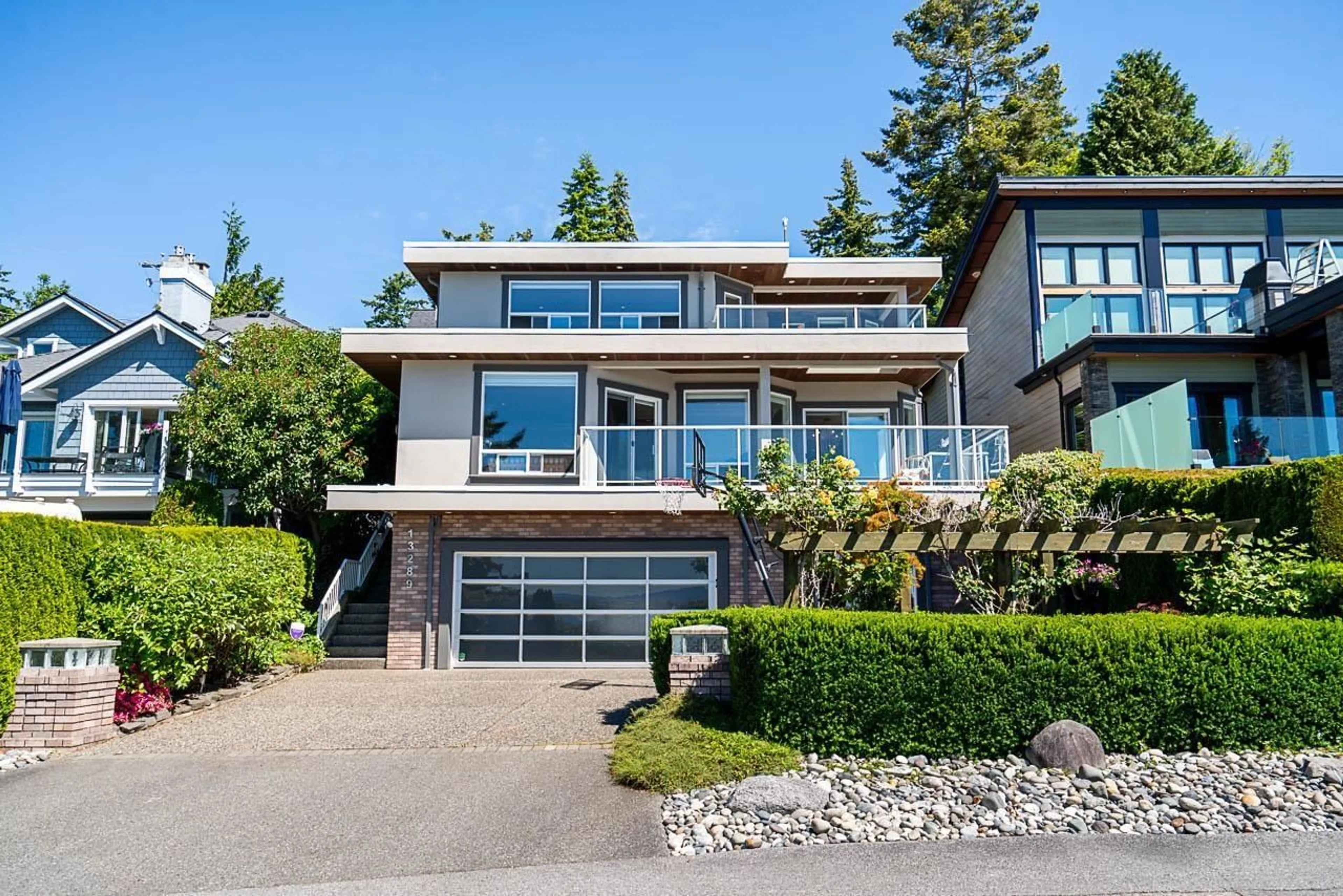 Home with vinyl exterior material, street for 13289 12B AVENUE, Surrey British Columbia V4A1C2