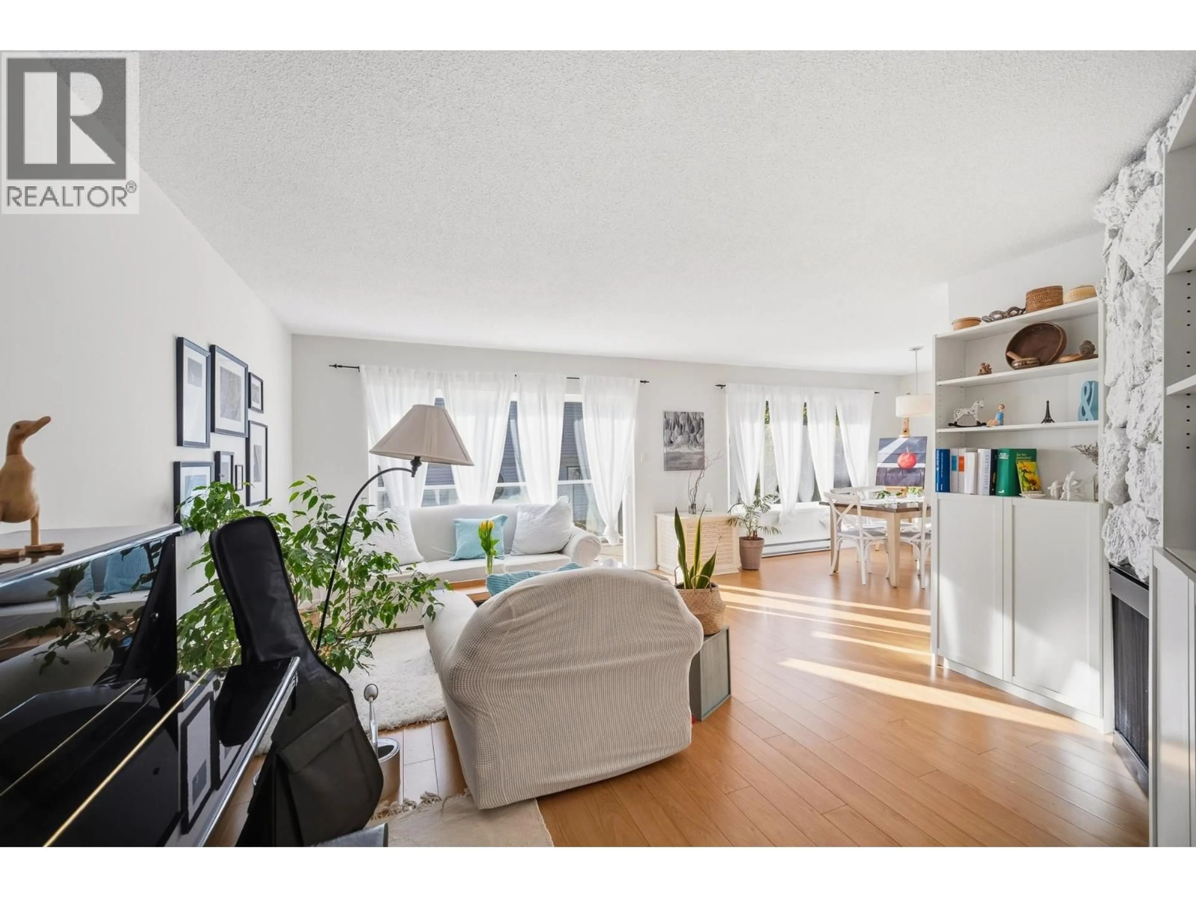 Living room with furniture, wood/laminate floor for 1309 MAHON AVENUE, North Vancouver British Columbia V7M2S2